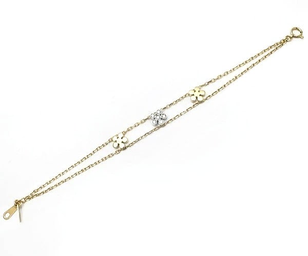 Bangle Repossi 18k Yellow White Two Tone Gold Diamond Flower Motif Bracelet: Bangle Repossi 18k Yellow White Two Tone Gold Diamond Flower Motif Bracelet This listing features Bangle Repossi 18k Yellow White Two Tone Gold Diamond Flower Motif Bracelet. Item specifics are provid