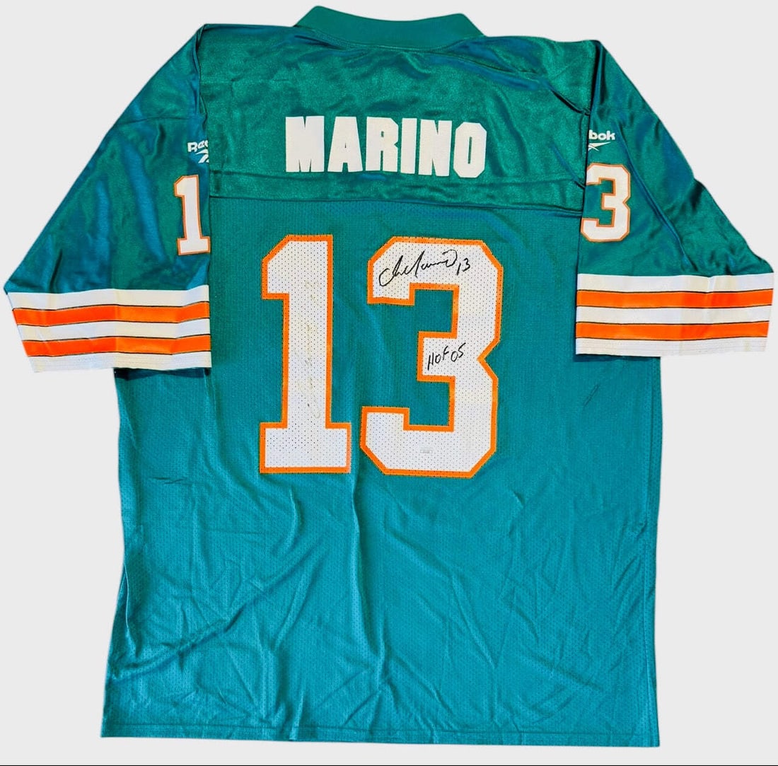 (JSA) Dan Marino Signed Authentic Reebok Throwback XL Jersey: (JSA) Dan Marino Signed Authentic Reebok Throwback XL Jersey This listing features (JSA) Dan Marino Signed Authentic Reebok Throwback XL Jersey. Item specifics are provided below. Item Specifics: