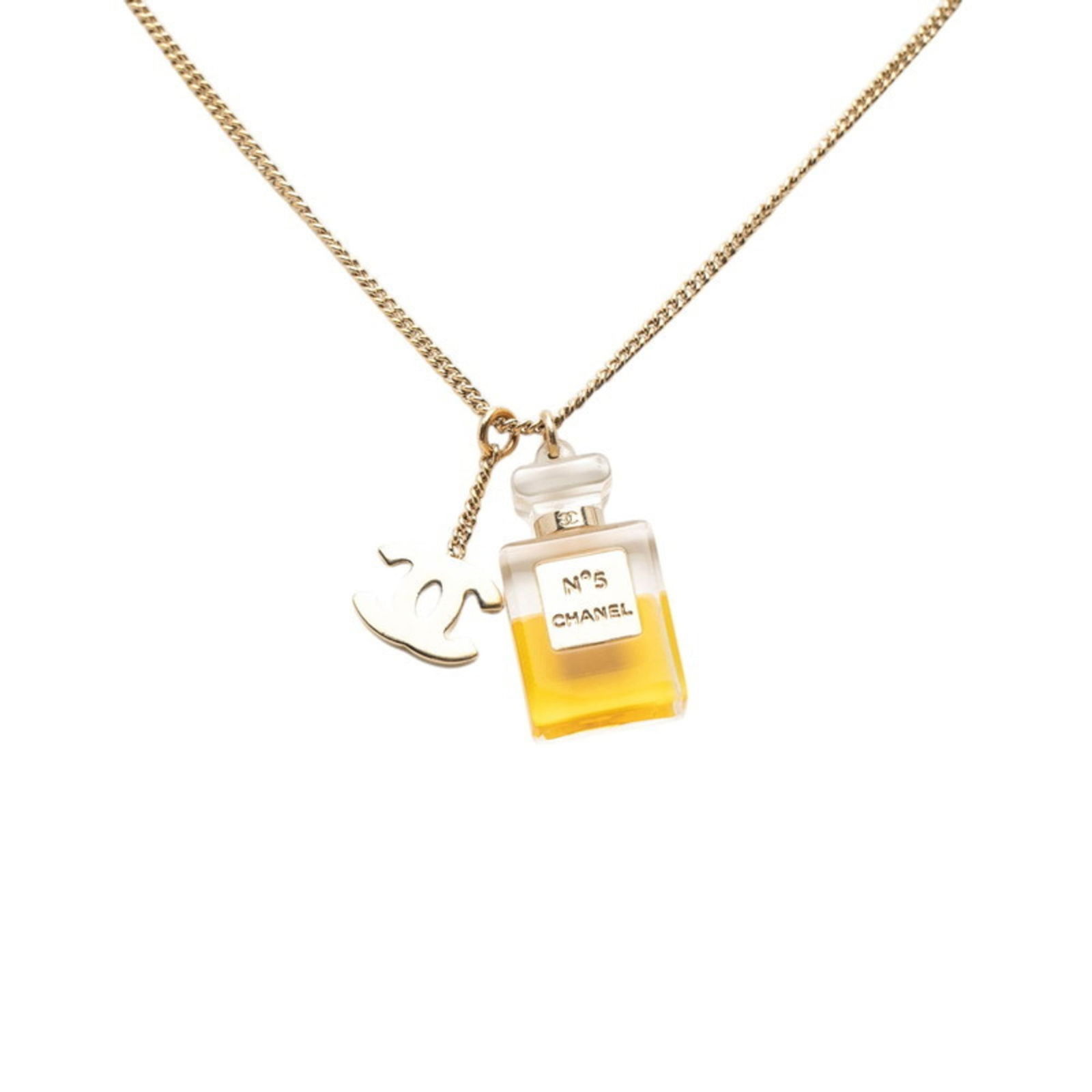 for Women - Chanel Coco Mark No. 5 Perfume Bottle Pendant Necklace in Gold and Clear Plastic -: for Women - Chanel Coco Mark No. 5 Perfume Bottle Pendant Necklace in Gold and Clear Plastic - Plated This listing features for Women - Chanel Coco Mark No. 5 Perfume Bottle Pendant Necklace in Gold