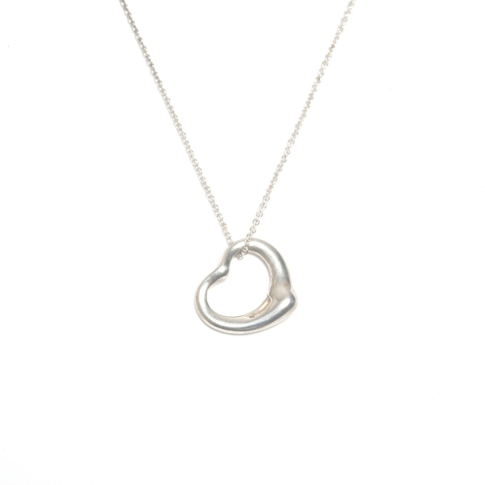 WS24572 Tiffany & Co. Open Heart 925 Sterling Silver Necklace: WS24572 Tiffany & Co. Open Heart 925 Sterling Silver Necklace This listing features WS24572 Tiffany & Co. Open Heart 925 Sterling Silver Necklace. Item specifics are provided below. Item Specifics: