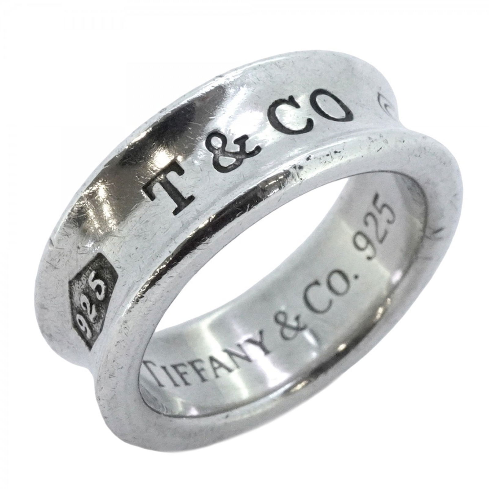 925 Tiffany Band Ring Silver: 925 Tiffany Band Ring Silver This listing features 925 Tiffany Band Ring Silver. Item specifics are provided below. Item Specifics: Brand: Tiffany Type: Band Ring Gender: Women Material: Silver 925 Us
