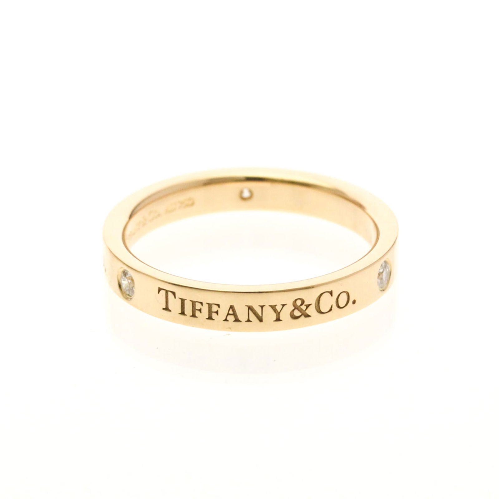 (18K) Tiffany Band Ring Pink Gold: (18K) Tiffany Band Ring Pink Gold This listing features (18K) Tiffany Band Ring Pink Gold. Item specifics are provided below. Item Specifics: Brand: Tiffany Type: Band Ring Style: Fashion Gender: Wome