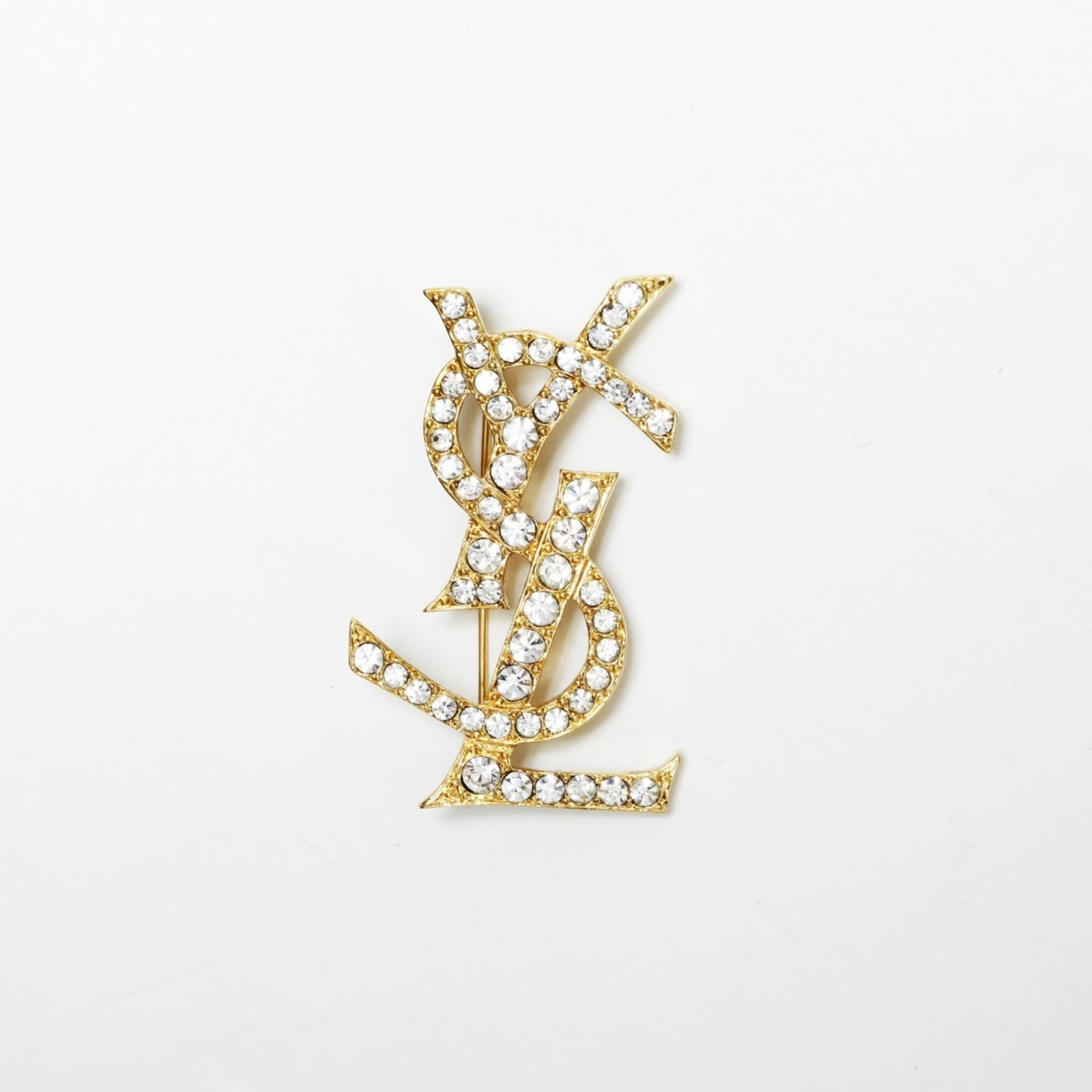 Brooch Yves Saint Laurent: Brooch Yves Saint Laurent This listing features Brooch Yves Saint Laurent. Item specifics are provided below. Item Specifics: Brand: Yves Saint Laurent Type: Brooch Gender: Women Color: Gold Size