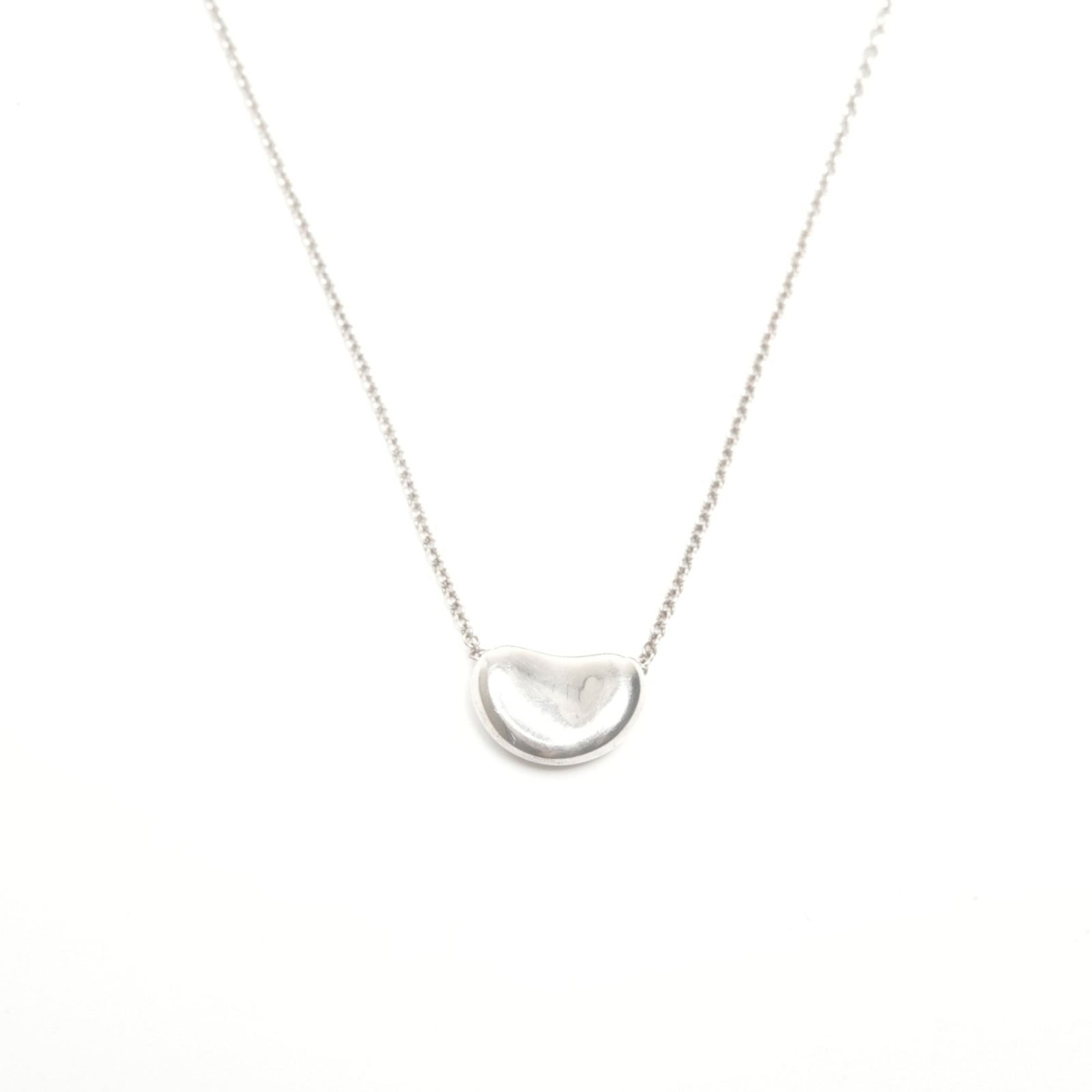 WS24561 - Tiffany & Co. 925 Bean Necklace in Silver: WS24561 - Tiffany & Co. 925 Bean Necklace in Silver This listing features WS24561 - Tiffany & Co. 925 Bean Necklace in Silver. Item specifics are provided below. Item Specifics: Brand: Tiffany
