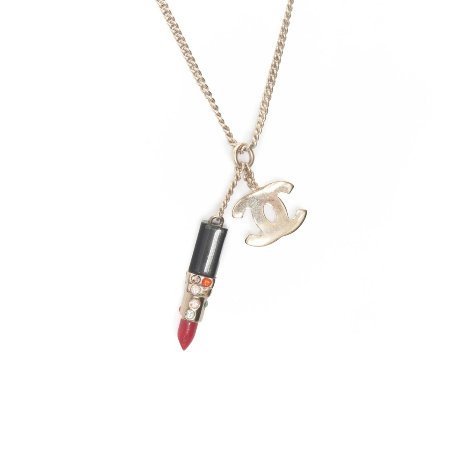Gold CHANEL 04A 2004 Coco Mark Lipstick Necklace in: Gold CHANEL 04A 2004 Coco Mark Lipstick Necklace in This listing features Gold CHANEL 04A 2004 Coco Mark Lipstick Necklace in. Item specifics are provided below. Item Specifics: Brand: Chanel