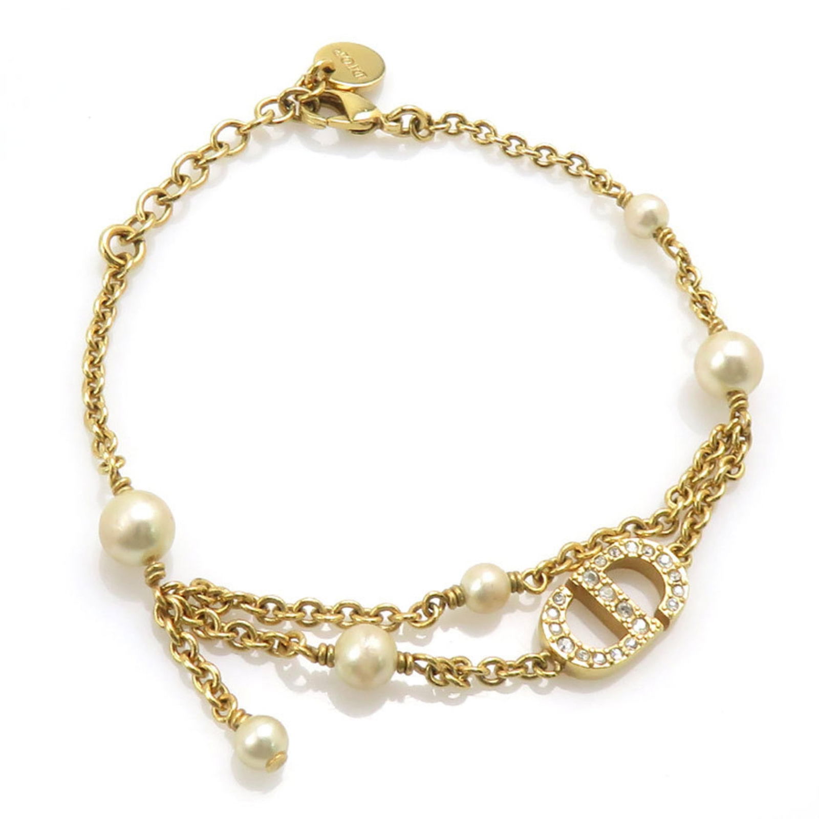 Metal Christian Dior Charm Bracelet: Metal Christian Dior Charm Bracelet This listing features Metal Christian Dior Charm Bracelet. Item specifics are provided below. Item Specifics: Brand: Christian Dior Type: Charm Bracelet Gender: Wom