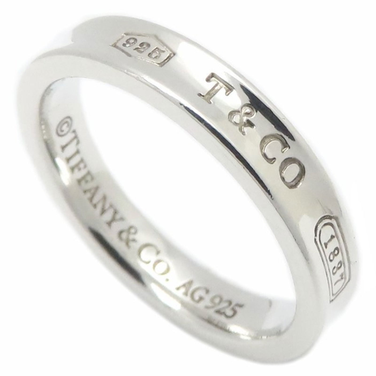 925 Tiffany Band Ring Silver: 925 Tiffany Band Ring Silver This listing features 925 Tiffany Band Ring Silver. Item specifics are provided below. Item Specifics: Brand: Tiffany Type: Band Ring Gender: Men Color: Silver Material: S