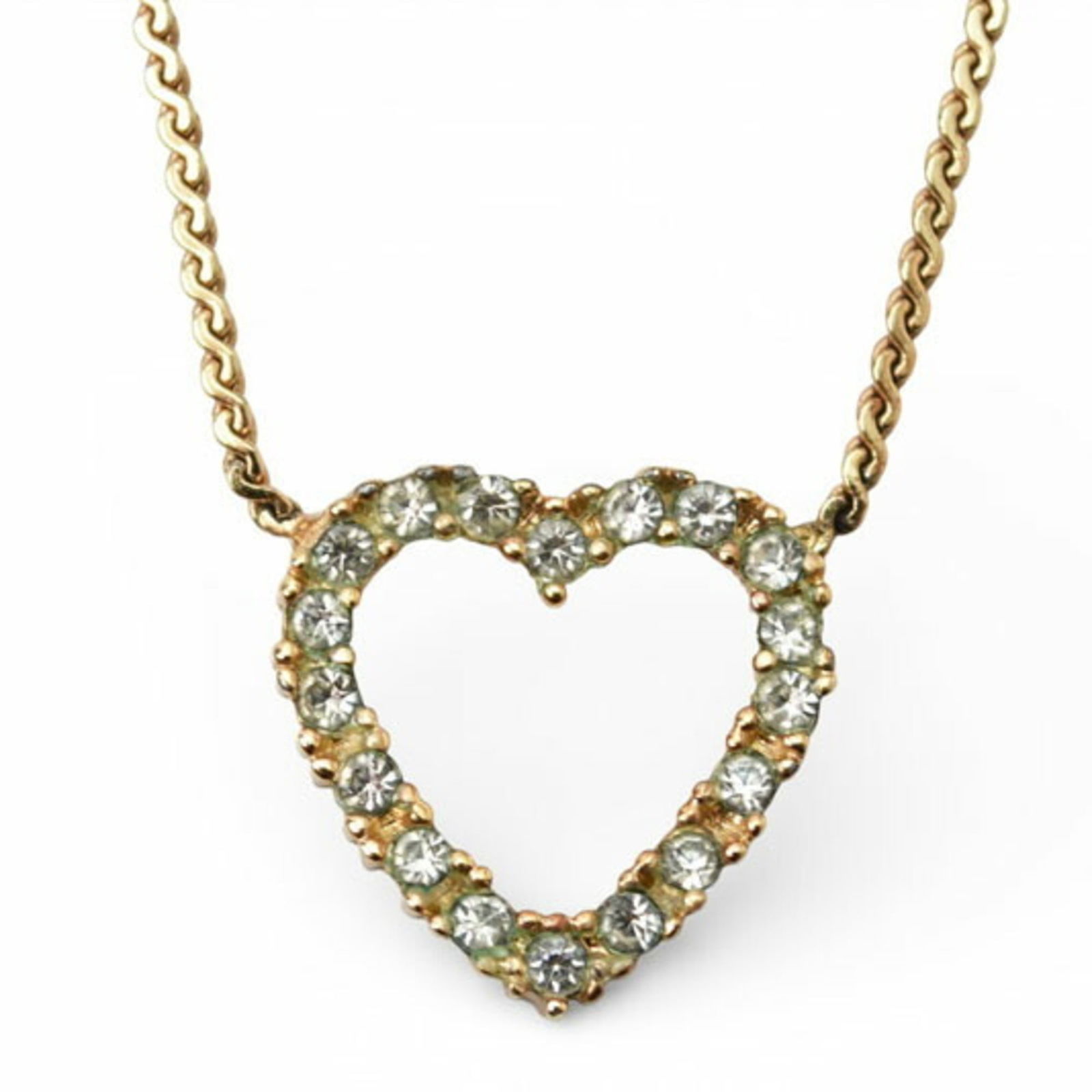 gold Christian Dior necklace pendant with heart motif and rhinestones in: gold Christian Dior necklace pendant with heart motif and rhinestones in This listing features gold Christian Dior necklace pendant with heart motif and rhinestones in. Item specifics are provided