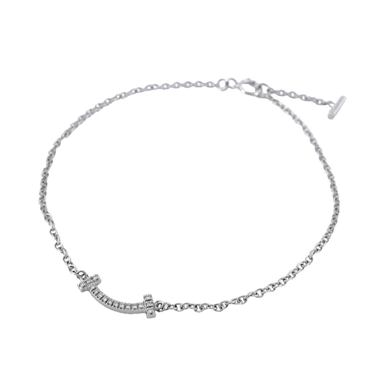 (18K) Tiffany Charm Bracelet White Gold: (18K) Tiffany Charm Bracelet White Gold This listing features (18K) Tiffany Charm Bracelet White Gold. Item specifics are provided below. Item Specifics: Brand: Tiffany Type: Charm Bracelet Gender: Wo