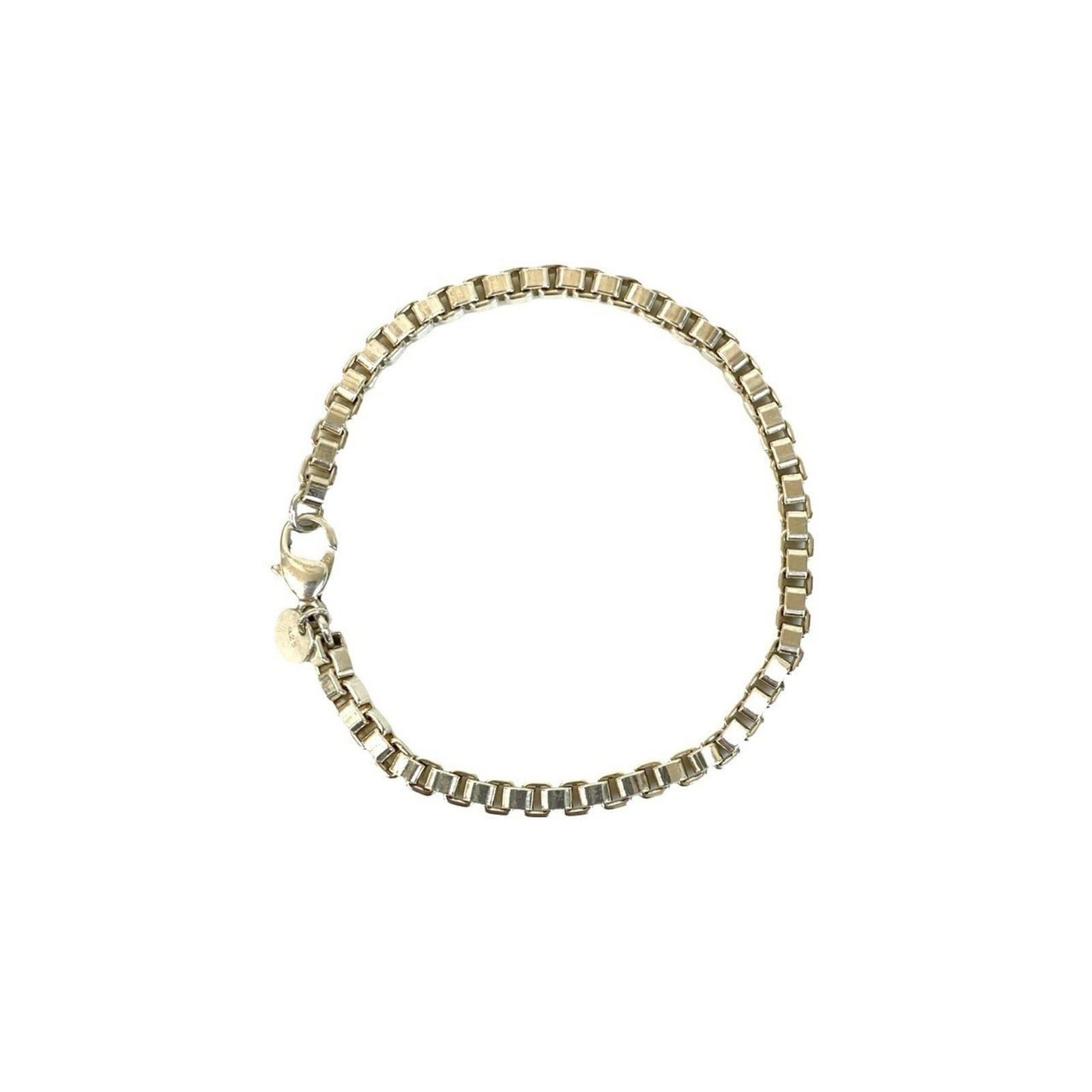 925 Tiffany Charm Bracelet Silver: 925 Tiffany Charm Bracelet Silver This listing features 925 Tiffany Charm Bracelet Silver. Item specifics are provided below. Item Specifics: Brand: Tiffany Type: Charm Bracelet Gender: Women Material