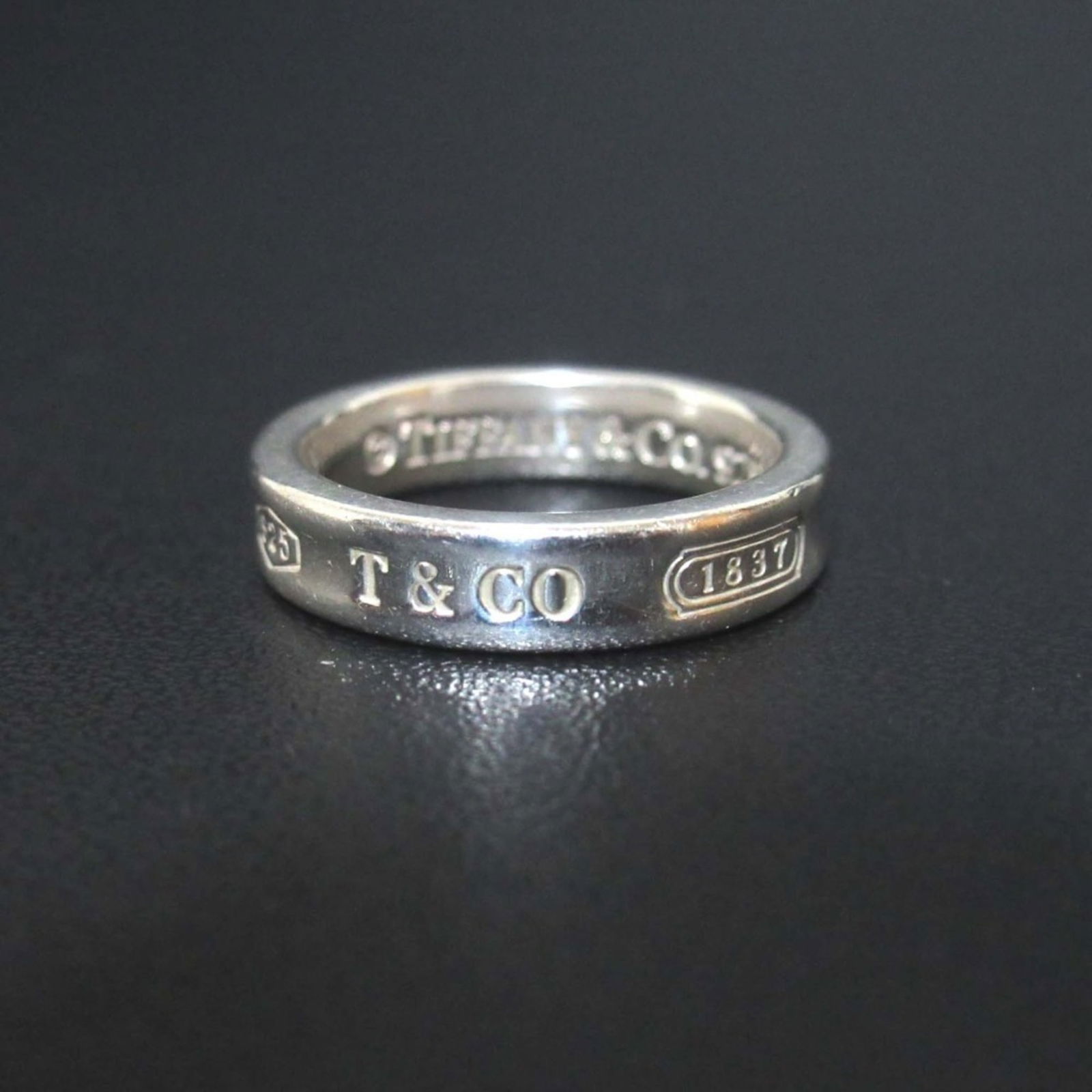 925 Tiffany Band Ring Silver: 925 Tiffany Band Ring Silver This listing features 925 Tiffany Band Ring Silver. Item specifics are provided below. Item Specifics: Brand: Tiffany Type: Band Ring Gender: Men,Women Color: Silver