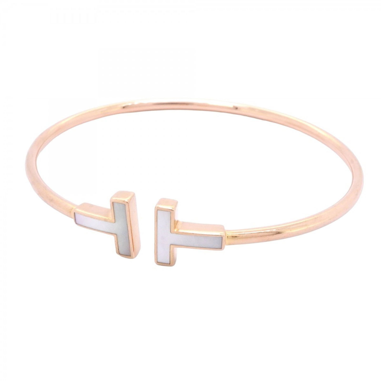 Pink Gold (18K) - Tiffany Bangle Mother Of Pearl: Pink Gold (18K) - Tiffany Bangle Mother Of Pearl This listing features Pink Gold (18K) - Tiffany Bangle Mother Of Pearl. Item specifics are provided below. Item Specifics: Brand: Tiffany Type: Bangle