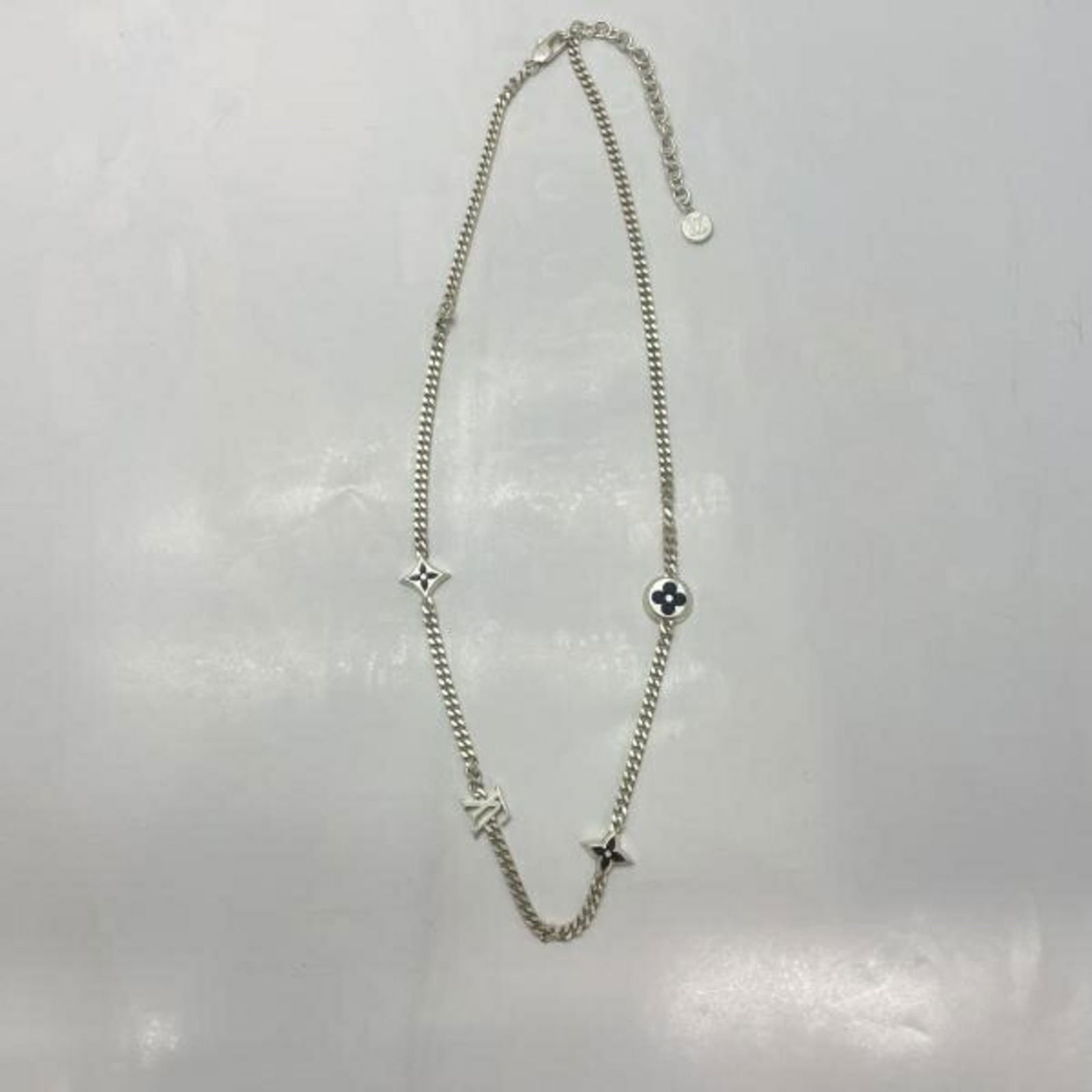 Louis Vuitton - LOUIS VUITTON LV Spike Charm Necklace - Silver - Box Included: Louis Vuitton - LOUIS VUITTON LV Spike Charm Necklace - Silver - Box Included This listing features Louis Vuitton - LOUIS VUITTON LV Spike Charm Necklace - Silver - Box Included. Item specifics are