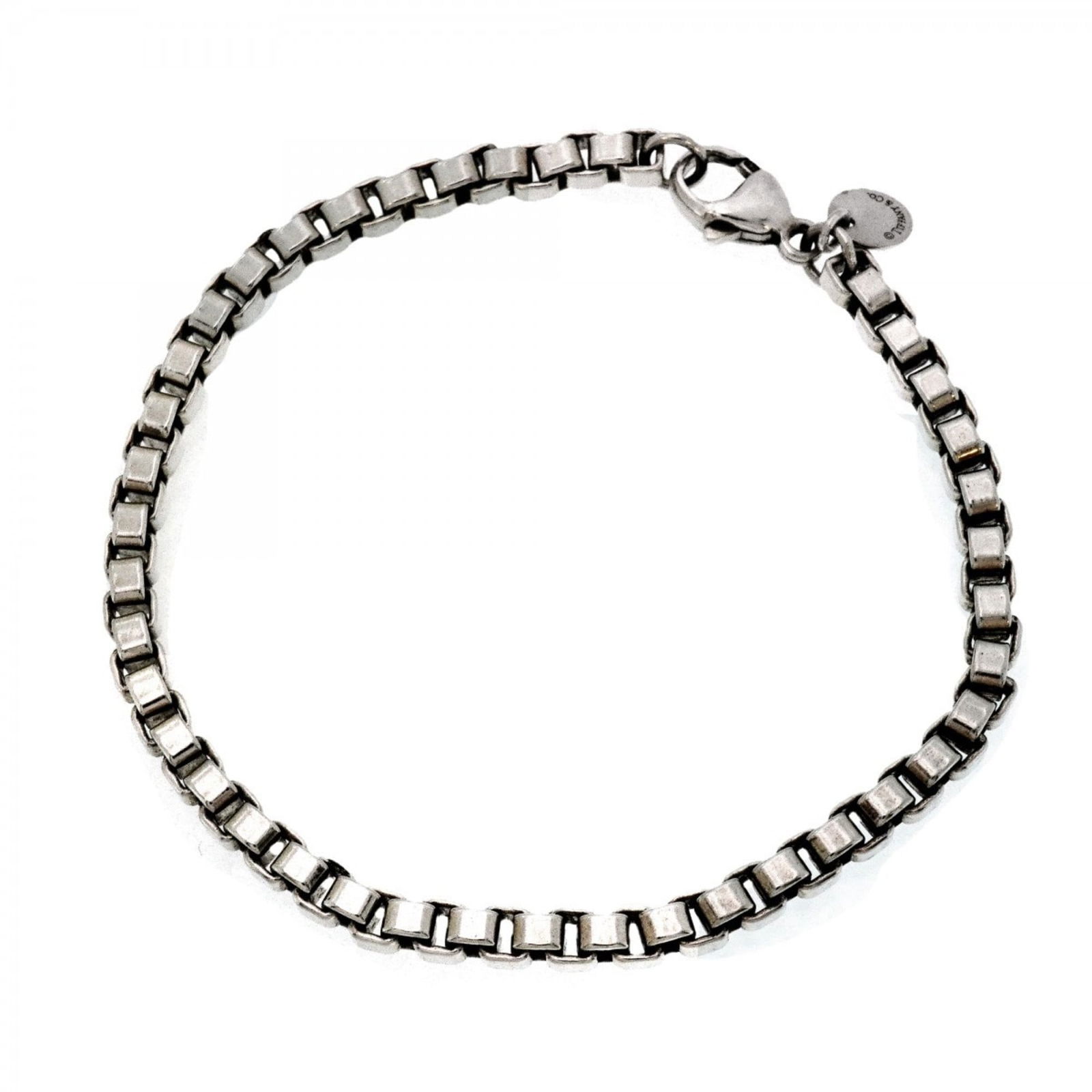 925 Tiffany Charm Bracelet Silver: 925 Tiffany Charm Bracelet Silver This listing features 925 Tiffany Charm Bracelet Silver. Item specifics are provided below. Item Specifics: Brand: Tiffany Type: Charm Bracelet Gender: Women