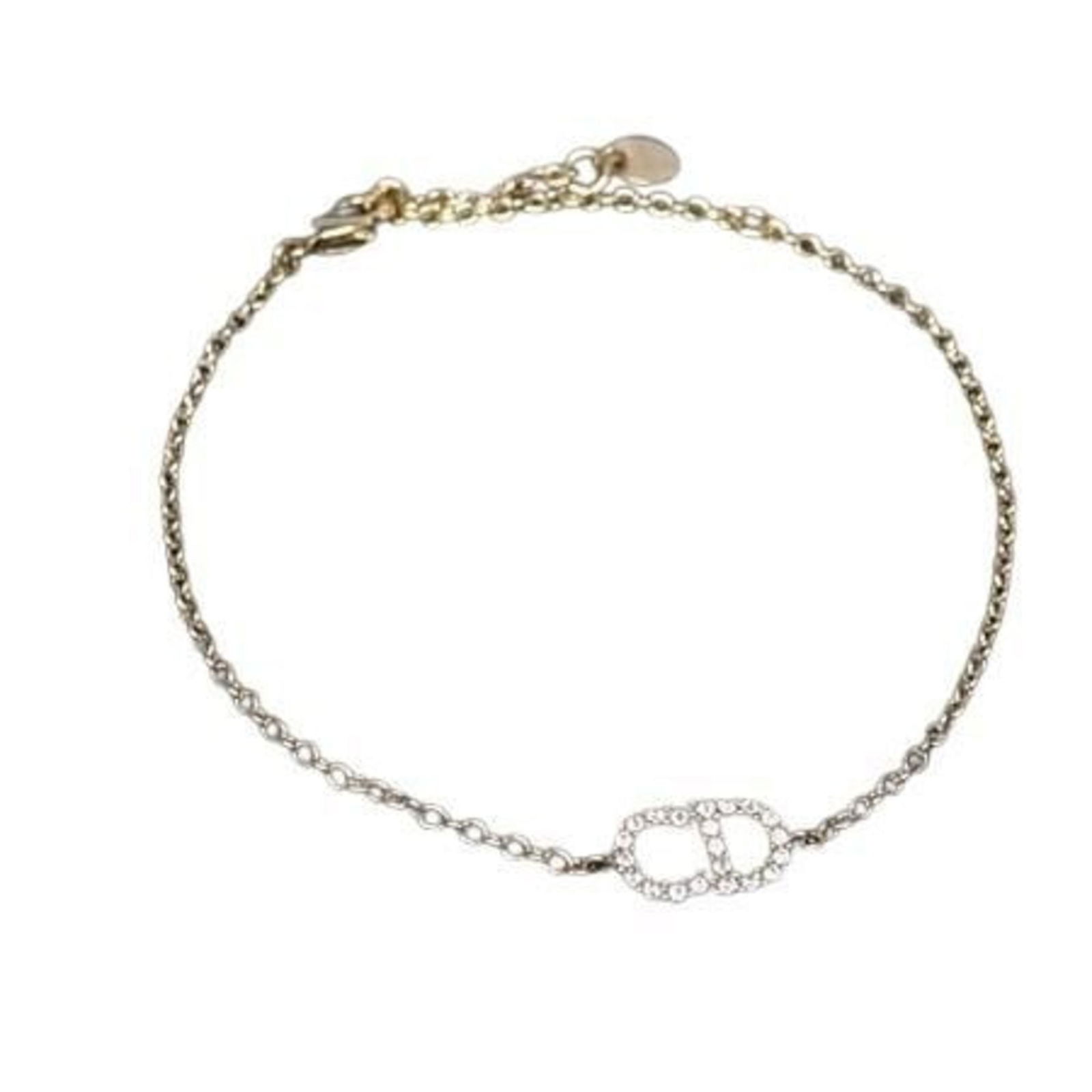 Metal Christian Dior Charm Bracelet: Metal Christian Dior Charm Bracelet This listing features Metal Christian Dior Charm Bracelet. Item specifics are provided below. Item Specifics: Brand: Christian Dior Type: Charm Bracelet Gender: