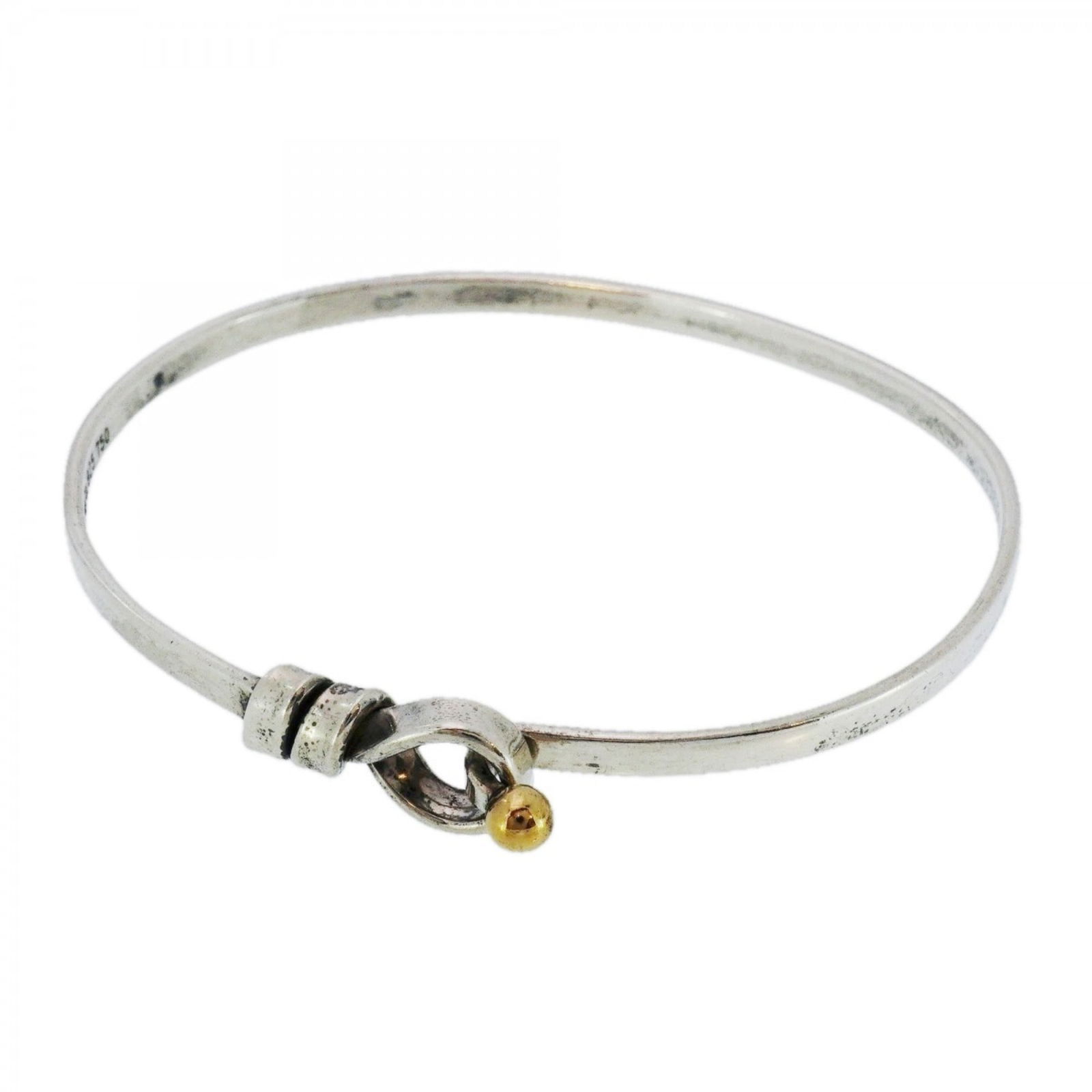 Yellow Gold (18K) - Tiffany Bangle Silver 925: Yellow Gold (18K) - Tiffany Bangle Silver 925 This listing features Yellow Gold (18K) - Tiffany Bangle Silver 925. Item specifics are provided below. Item Specifics: Brand: Tiffany Type: Bangle