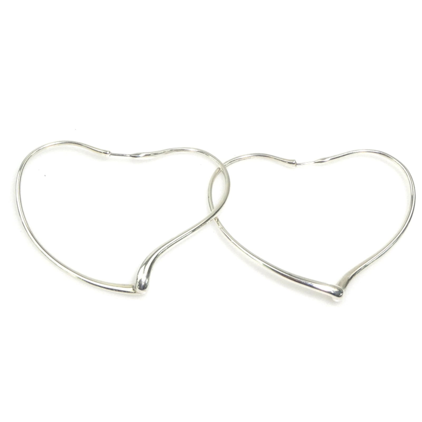 925 Tiffany Hoop Earrings Silver: 925 Tiffany Hoop Earrings Silver This listing features 925 Tiffany Hoop Earrings Silver. Item specifics are provided below. Item Specifics: Brand: Tiffany Type: Hoop Earrings Gender: Women Material: S