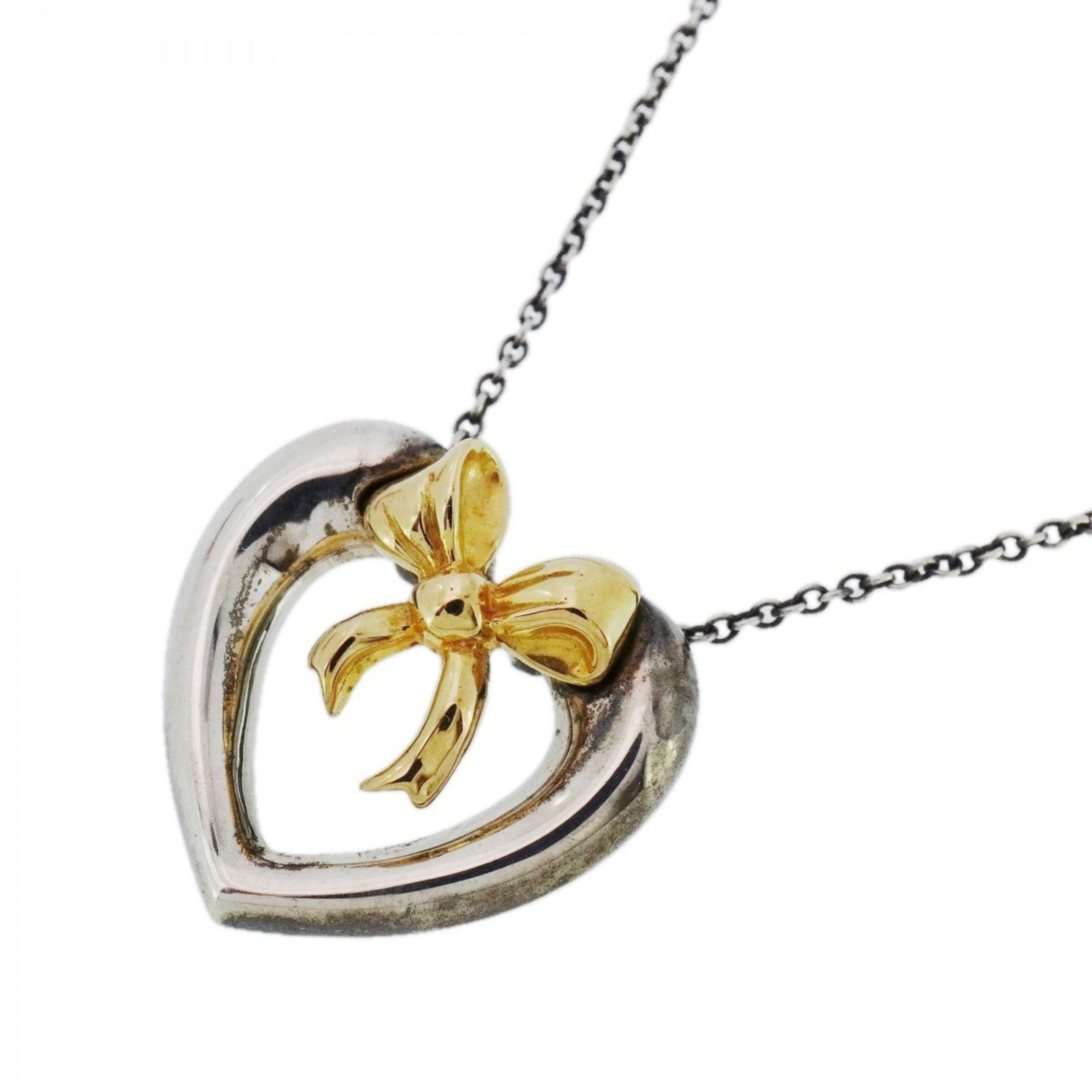 Women Tiffany Heart Ribbon Necklace in 18K Yellow Gold and 925 Silver for: Women Tiffany Heart Ribbon Necklace in 18K Yellow Gold and 925 Silver for This listing features Women Tiffany Heart Ribbon Necklace in 18K Yellow Gold and 925 Silver for. Item specifics are provided