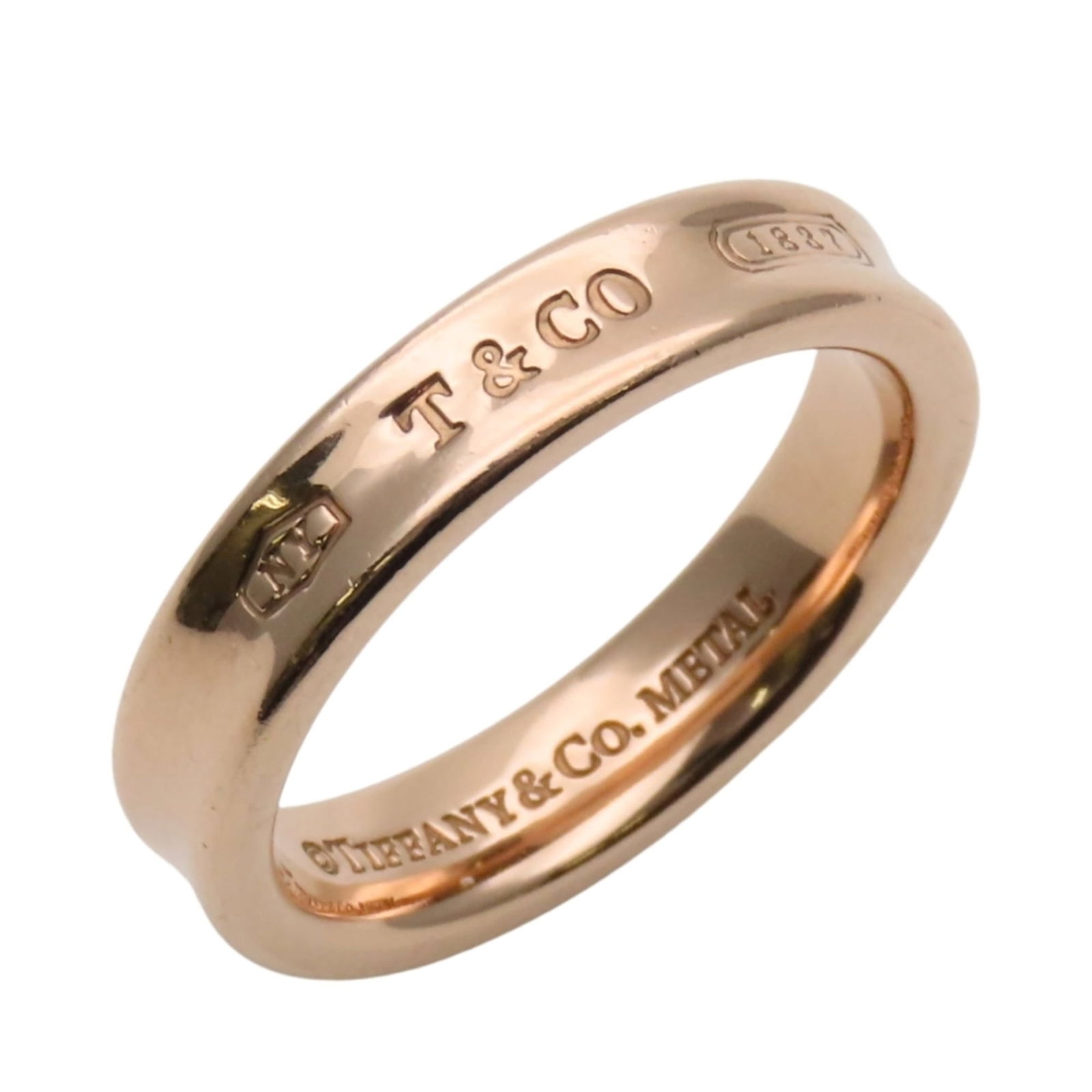 Metal Tiffany Band Ring: Metal Tiffany Band Ring This listing features Metal Tiffany Band Ring. Item specifics are provided below. Item Specifics: Brand: Tiffany Type: Band Ring Gender: Women Color: Pink Material: Metal Us