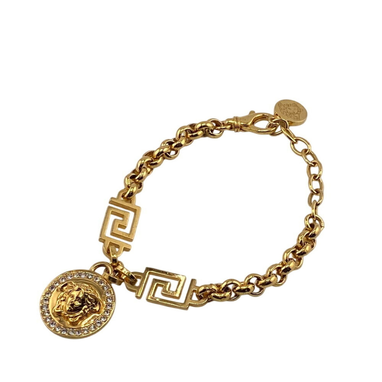 Brass Versace Charm Bracelet: Brass Versace Charm Bracelet This listing features Brass Versace Charm Bracelet. Item specifics are provided below. Item Specifics: Brand: Versace Type: Charm Bracelet Gender: Women Material: Brass Co