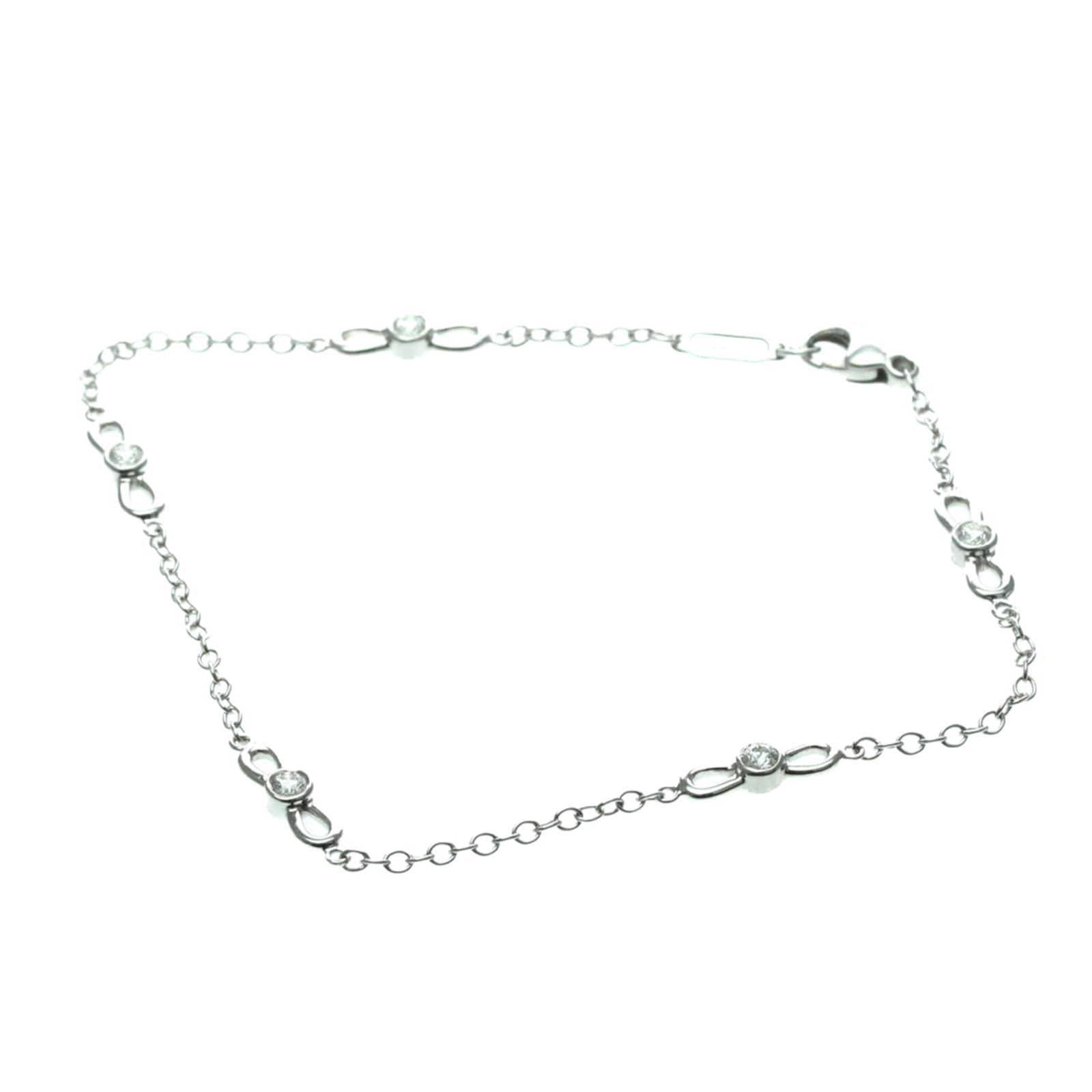 (18K) Tiffany Charm Bracelet White Gold: (18K) Tiffany Charm Bracelet White Gold This listing features (18K) Tiffany Charm Bracelet White Gold. Item specifics are provided below. Item Specifics: Brand: Tiffany Type: Charm Bracelet Style: