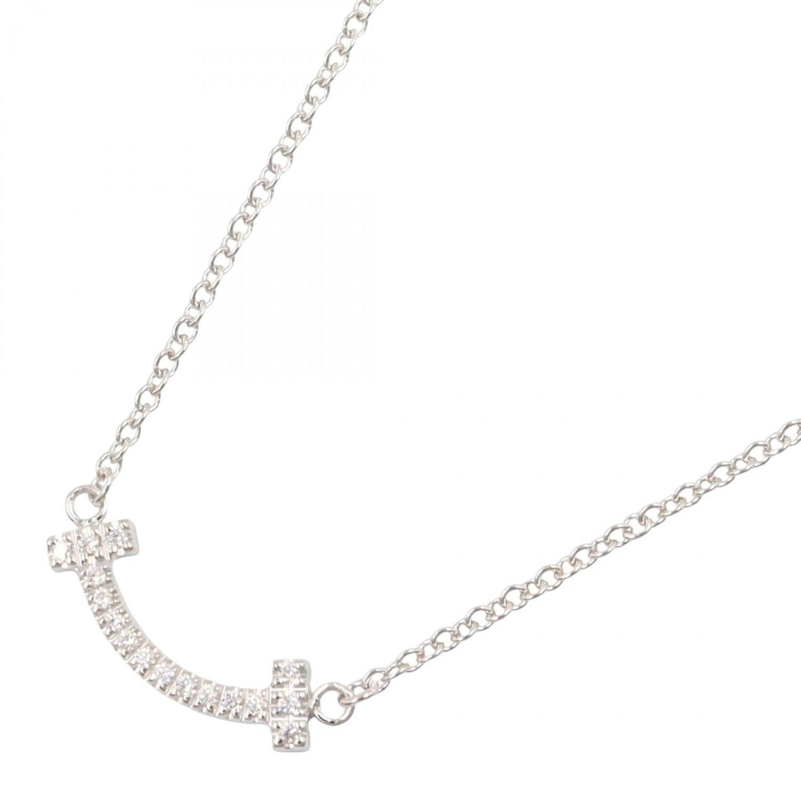 62617799 - Tiffany & Co. T Smile Necklace - Mini Diamond 18K White Gold - Diamond - Women's -: 62617799 - Tiffany & Co. T Smile Necklace - Mini Diamond 18K White Gold - Diamond - Women's - Silver - Clear This listing features 62617799 - Tiffany & Co. T Smile Necklace - Mini Diamond 18K White