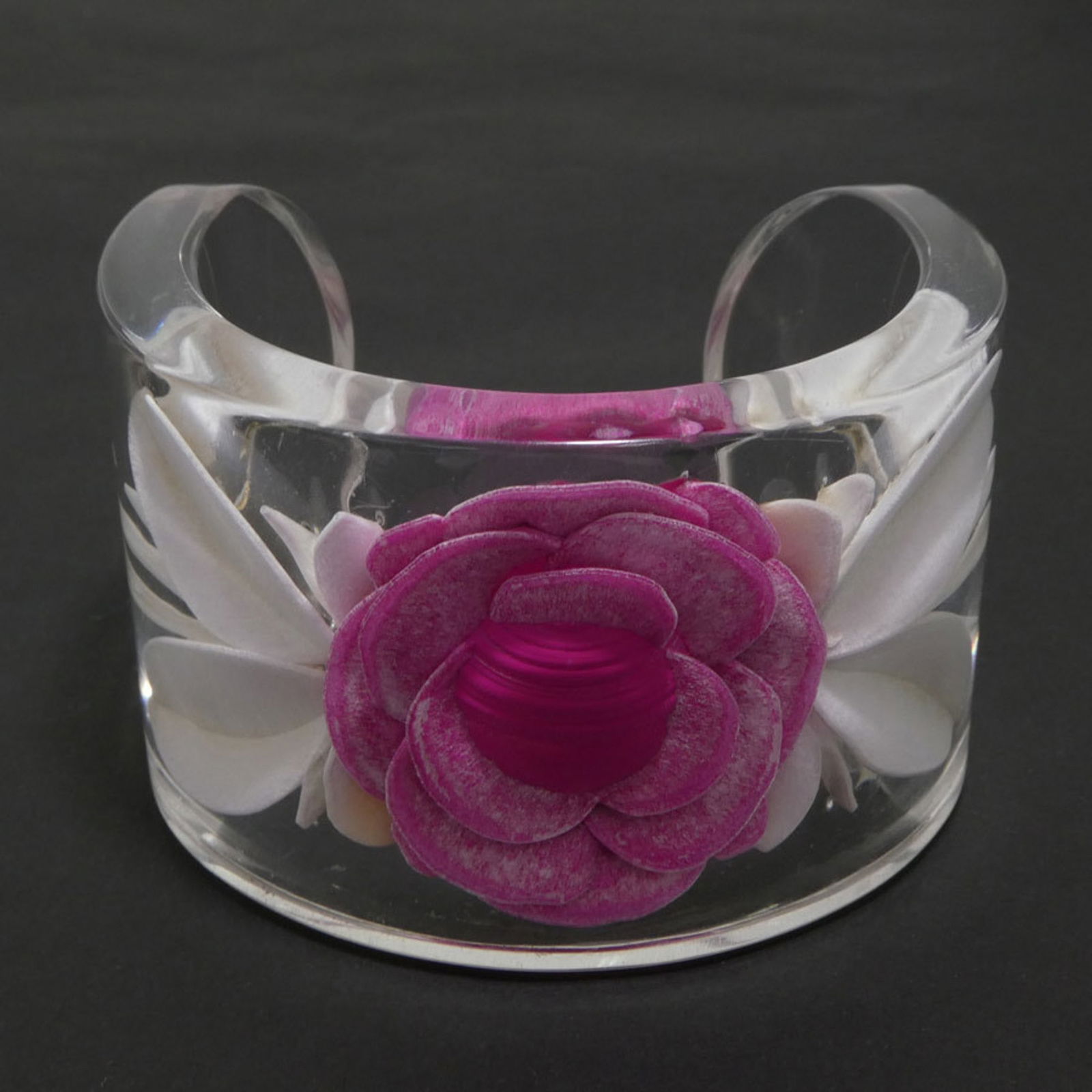 Resin Chanel Bangle: Resin Chanel Bangle This listing features Resin Chanel Bangle. Item specifics are provided below. Item Specifics: Brand: Chanel Type: Bangle Gender: Women Material: Resin Color: Clear, Pink, White Len