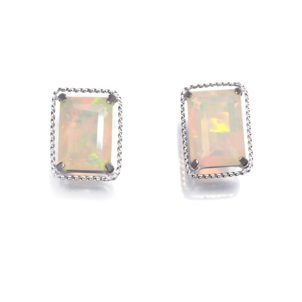 Gold Opal 0.60Ct/ 0.60Ct Earrings 18K 750 White: Gold Opal 0.60Ct/ 0.60Ct Earrings 18K 750 White This listing features Gold Opal 0.60Ct/ 0.60Ct Earrings 18K 750 White. Item specifics are provided below. Item Specifics: Metal: White Gold Metal Purity