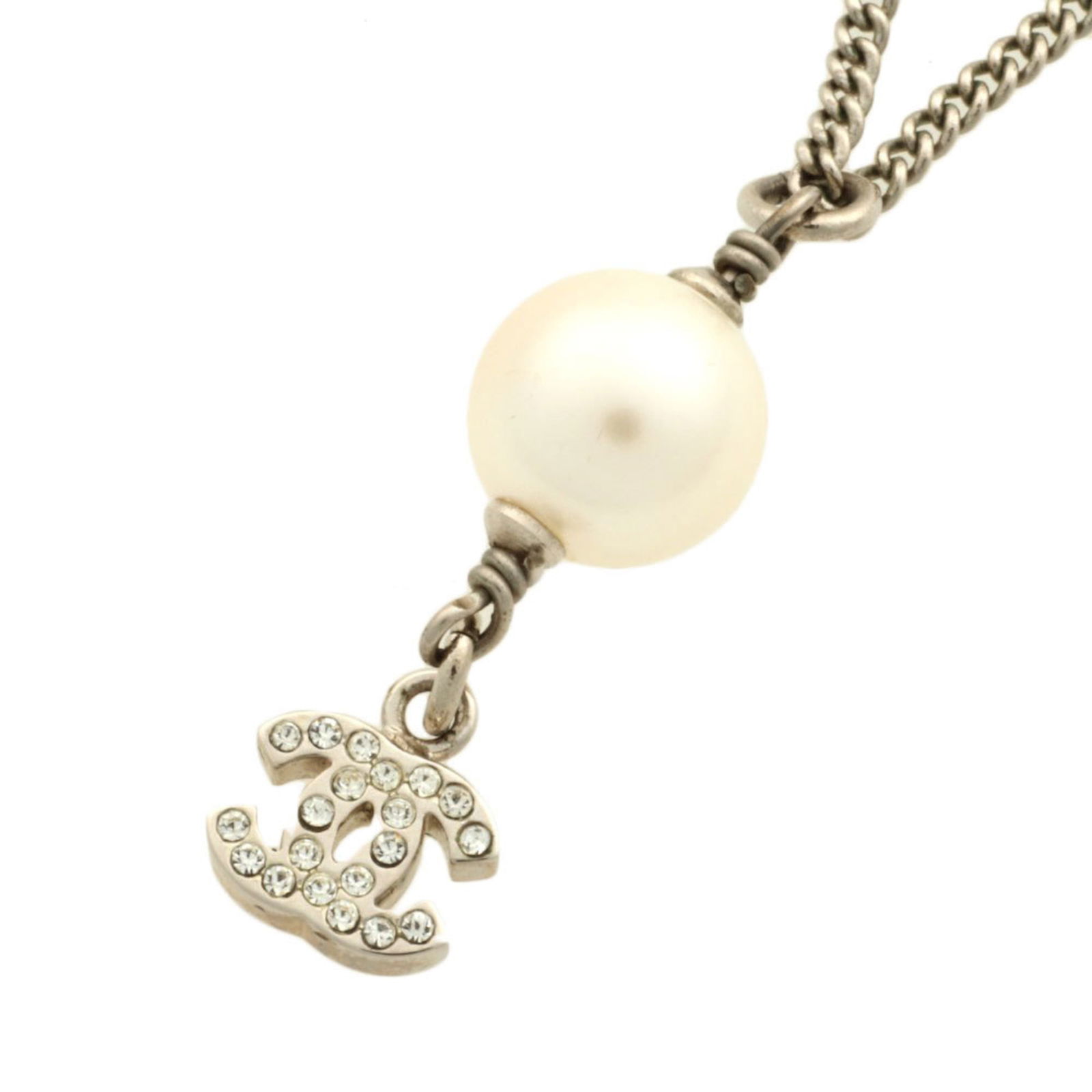 07A CHANEL Coco Mark Faux Pearl Rhinestone Necklace: 07A CHANEL Coco Mark Faux Pearl Rhinestone Necklace This listing features 07A CHANEL Coco Mark Faux Pearl Rhinestone Necklace. Item specifics are provided below. Item Specifics: Brand: Chanel Necklace