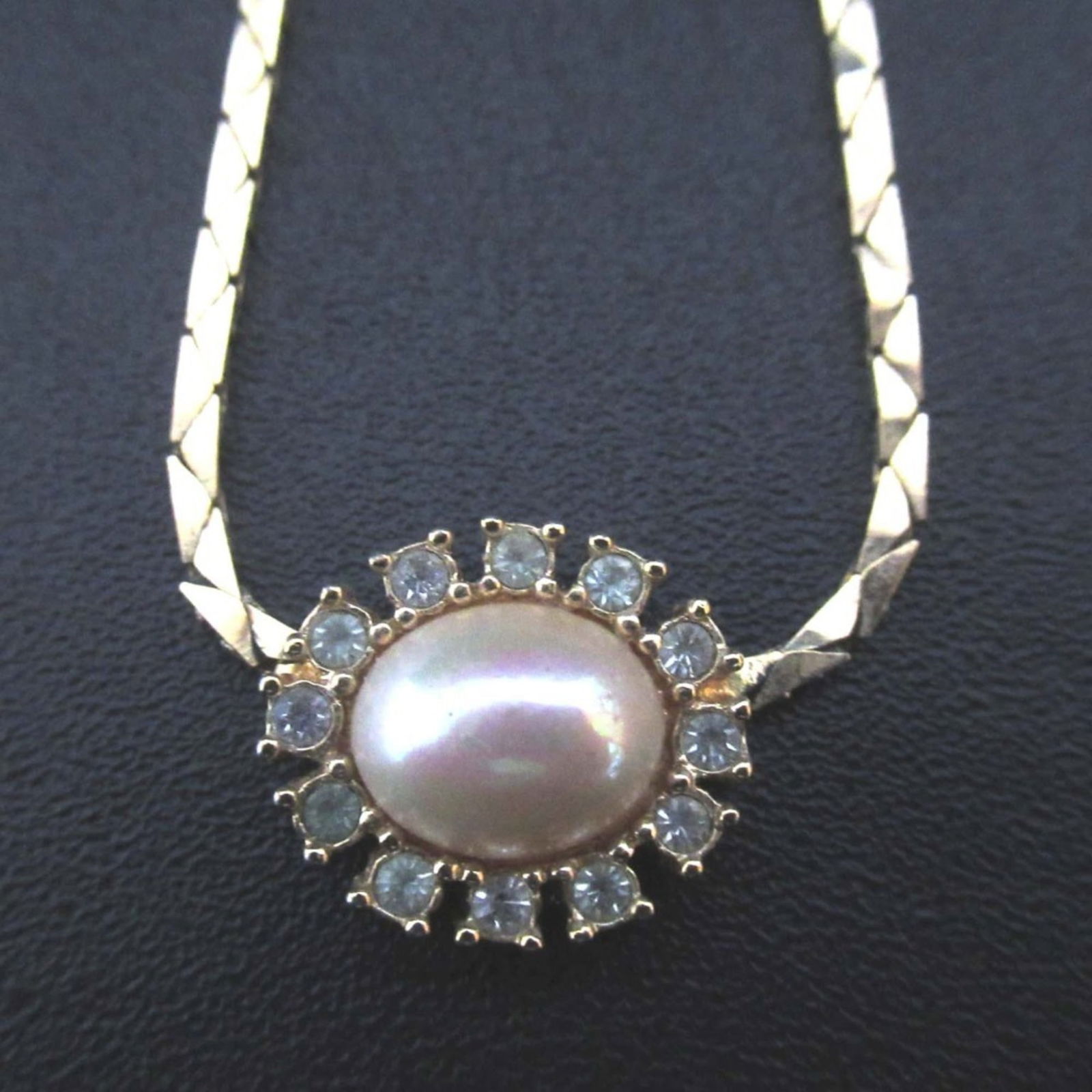 Women's - Christian Dior Faux Pearl and Rhinestone Snake Chain Necklace - GP - Gold: Women's - Christian Dior Faux Pearl and Rhinestone Snake Chain Necklace - GP - Gold This listing features Women's - Christian Dior Faux Pearl and Rhinestone Snake Chain Necklace - GP - Gold. Item