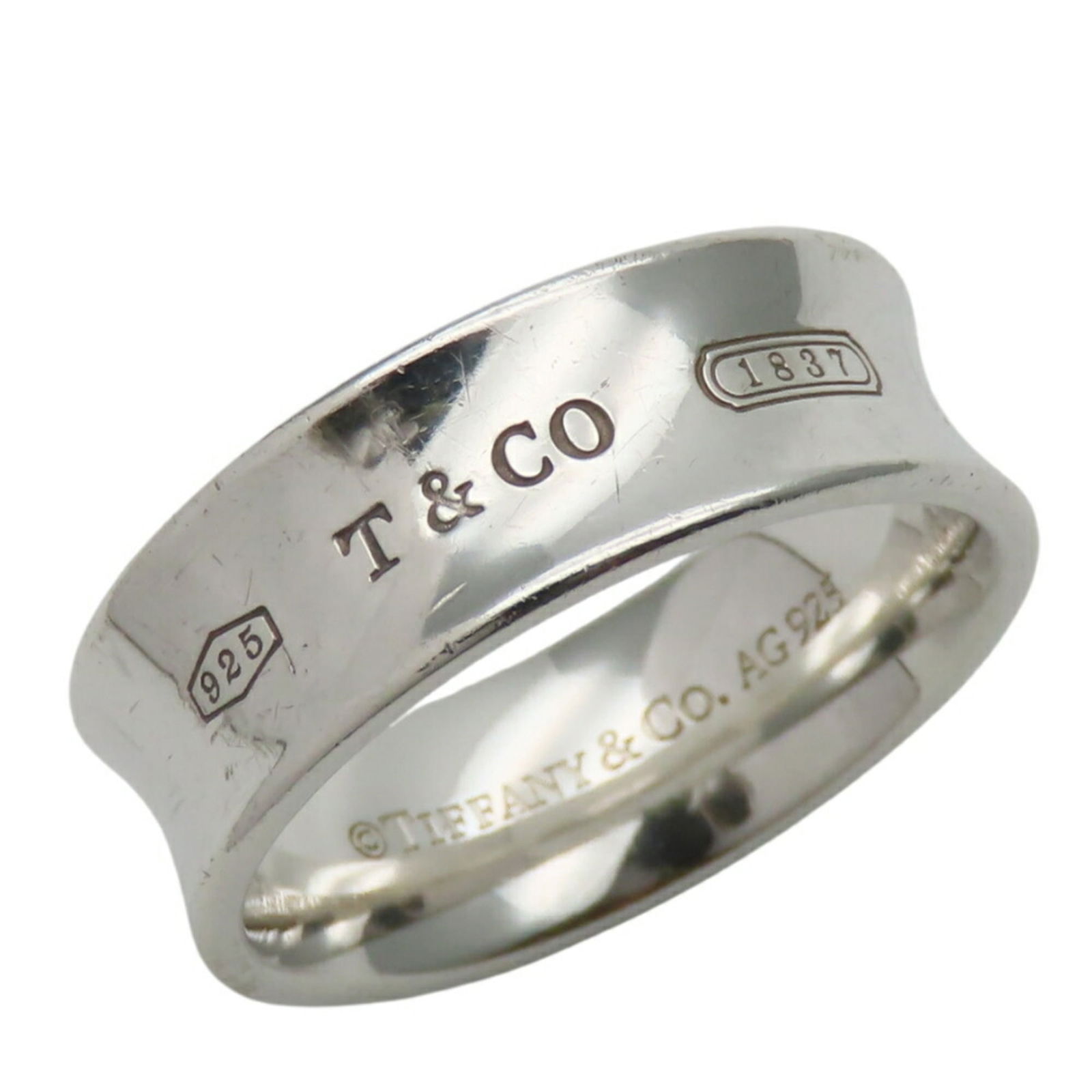 925 Tiffany Band Ring Silver: 925 Tiffany Band Ring Silver This listing features 925 Tiffany Band Ring Silver. Item specifics are provided below. Item Specifics: Brand: Tiffany Type: Band Ring Gender: Women Color: Silver Material: