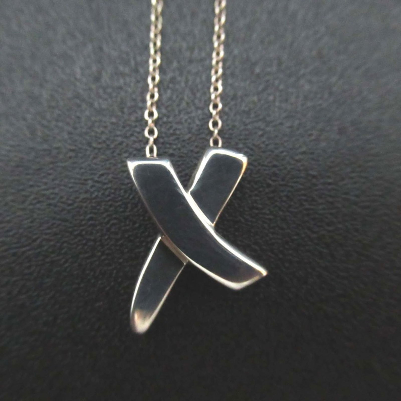 Women Tiffany & Co. Paloma Picasso Graffiti X Kiss Necklace Pendant in 925 SV Silver for: Women Tiffany & Co. Paloma Picasso Graffiti X Kiss Necklace Pendant in 925 SV Silver for This listing features Women Tiffany & Co. Paloma Picasso Graffiti X Kiss Necklace Pendant in 925 SV Silver