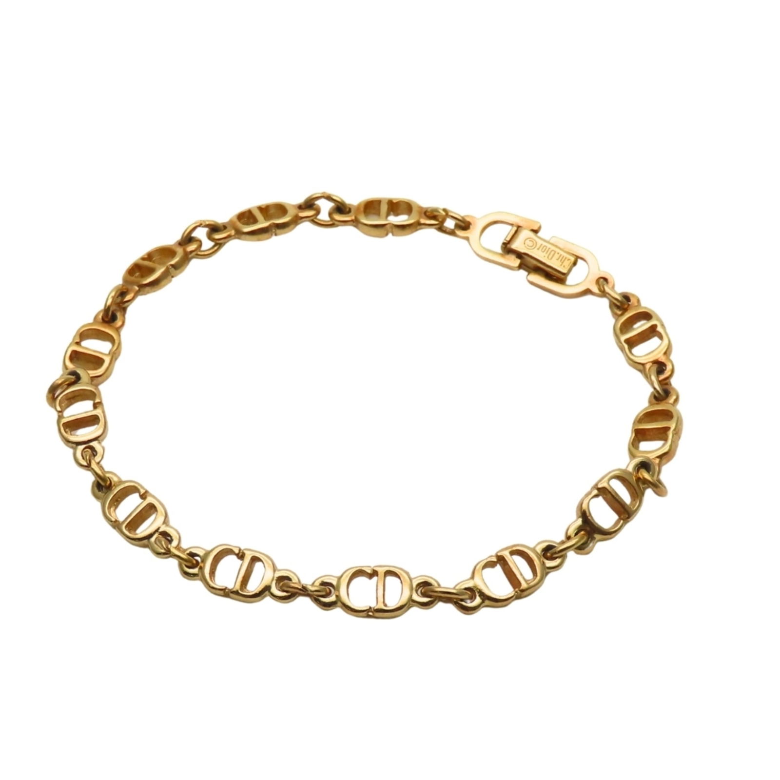 Metal Christian Dior Charm Bracelet: Metal Christian Dior Charm Bracelet This listing features Metal Christian Dior Charm Bracelet. Item specifics are provided below. Item Specifics: Brand: Christian Dior Type: Charm Bracelet Gender: