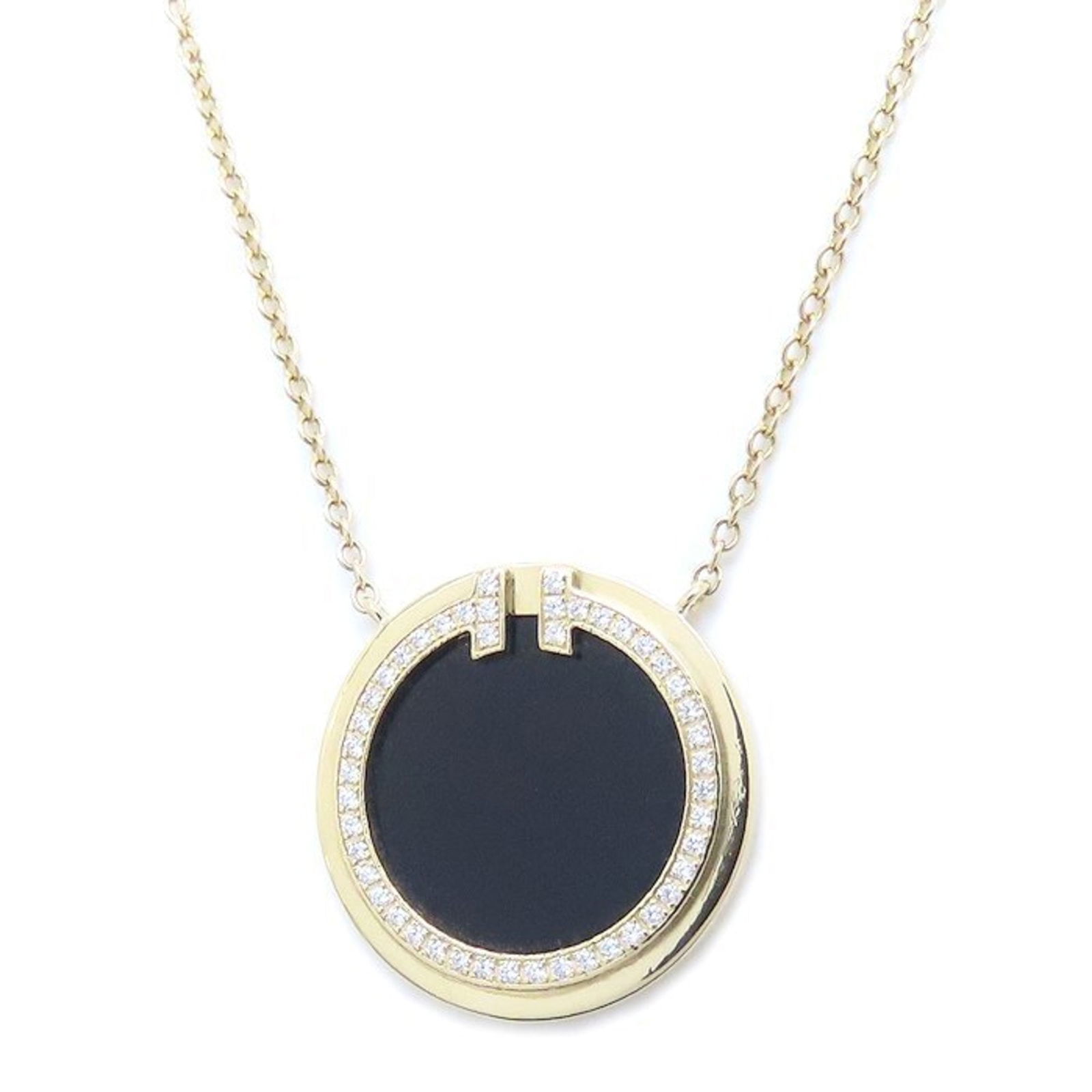 294456 - TIFFANY & Co. Tiffany T Circle Onyx and Diamond Necklace - 18K Yellow Gold - Women's: 294456 - TIFFANY & Co. Tiffany T Circle Onyx and Diamond Necklace - 18K Yellow Gold - Women's This listing features 294456 - TIFFANY & Co. Tiffany T Circle Onyx and Diamond Necklace - 18K Yellow Gold