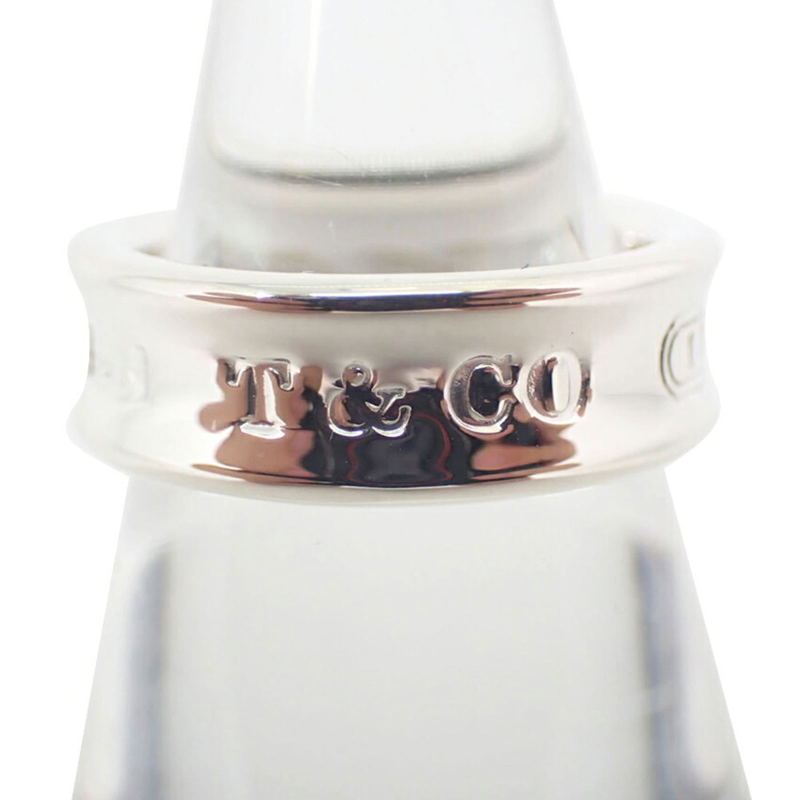 925 Tiffany Band Ring Sterling Silver: 925 Tiffany Band Ring Sterling Silver This listing features 925 Tiffany Band Ring Sterling Silver. Item specifics are provided below. Item Specifics: Brand: Tiffany Type: Band Ring Gender: Women