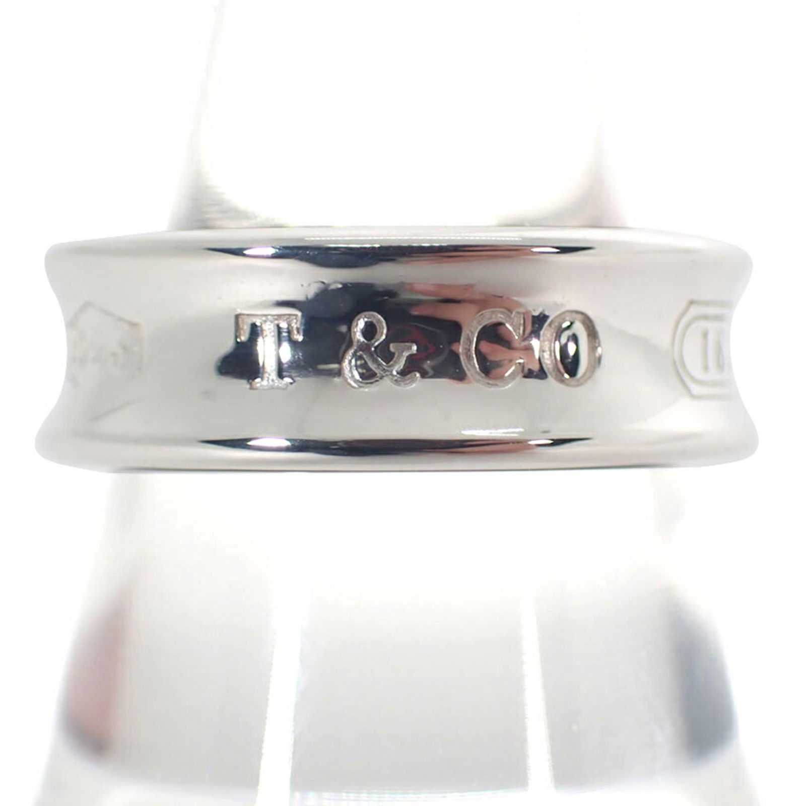 925 Tiffany Band Ring Sterling Silver: 925 Tiffany Band Ring Sterling Silver This listing features 925 Tiffany Band Ring Sterling Silver. Item specifics are provided below. Item Specifics: Brand: Tiffany Type: Band Ring Gender: Women