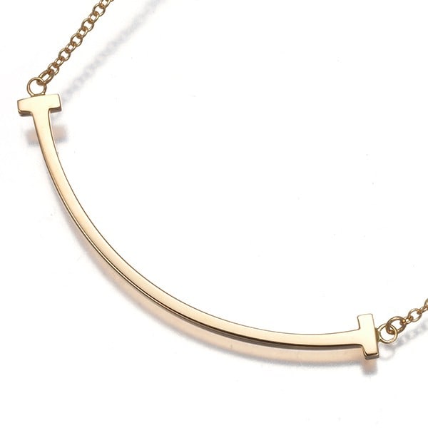 Gold Tiffany&Co. Necklace Tiffany T Smile Small 18K 750 Rose: Gold Tiffany&Co. Necklace Tiffany T Smile Small 18K 750 Rose This listing features Gold Tiffany&Co. Necklace Tiffany T Smile Small 18K 750 Rose. Item specifics are provided below. Item Specifics: