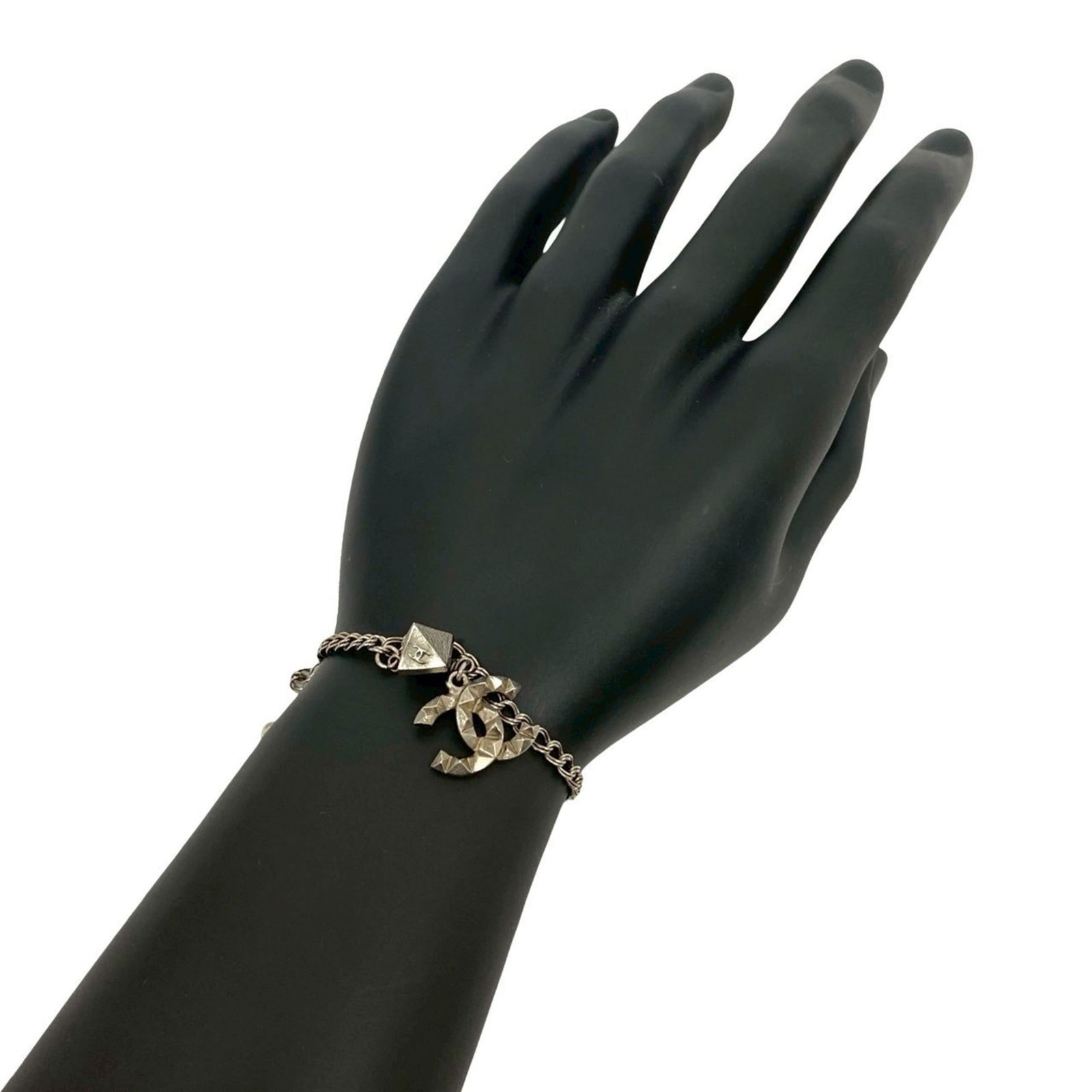 Metal Chanel Charm Bracelet: Metal Chanel Charm Bracelet This listing features Metal Chanel Charm Bracelet. Item specifics are provided below. Item Specifics: Brand: Chanel Type: Charm Bracelet Gender: Women Material: Metal Color