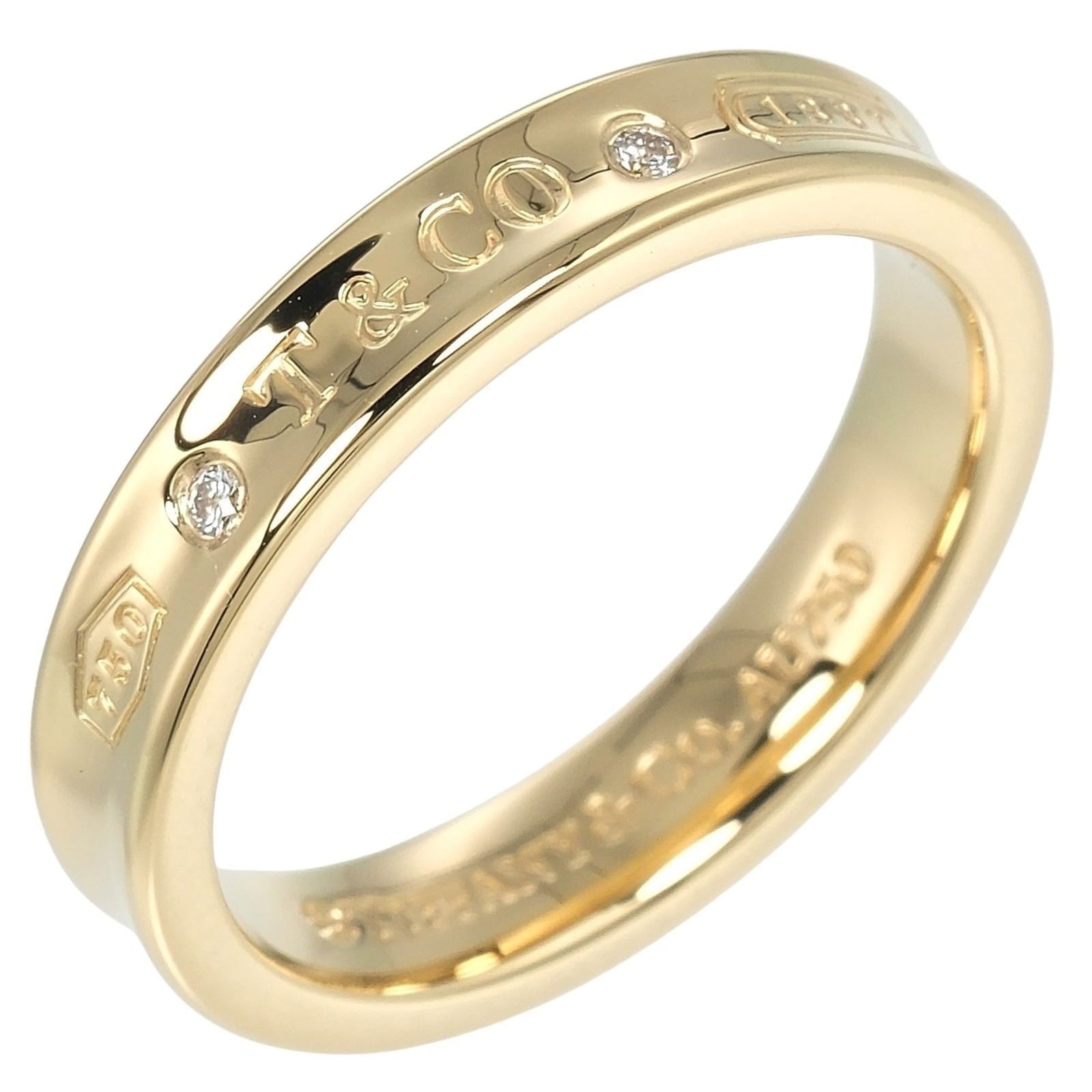 (18K) Tiffany Band Ring Yellow Gold: (18K) Tiffany Band Ring Yellow Gold This listing features (18K) Tiffany Band Ring Yellow Gold. Item specifics are provided below. Item Specifics: Brand: Tiffany Type: Band Ring Gender: Women Color: