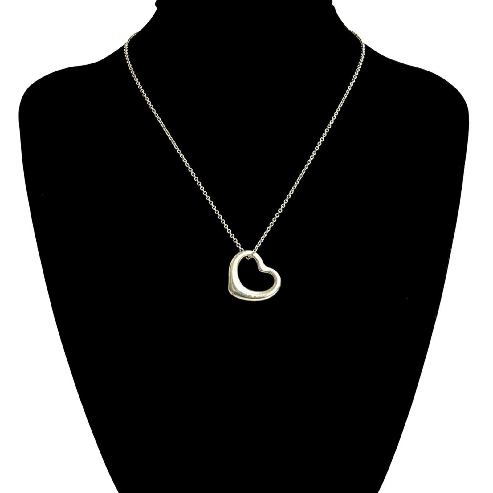 2075b TIFFANY & Co. Tiffany Open Heart Motif Sterling Silver 925 Necklace Pendant: 2075b TIFFANY & Co. Tiffany Open Heart Motif Sterling Silver 925 Necklace Pendant This listing features 2075b TIFFANY & Co. Tiffany Open Heart Motif Sterling Silver 925 Necklace Pendant. Item