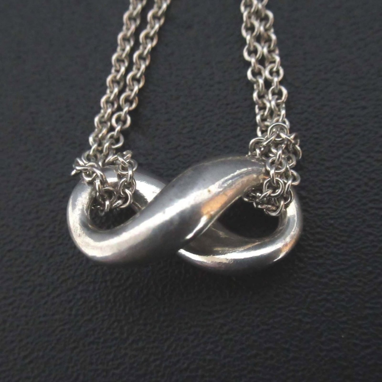 Women's Tiffany & Co. Infinity Necklace 925SV Silver: Women's Tiffany & Co. Infinity Necklace 925SV Silver This listing features Women's Tiffany & Co. Infinity Necklace 925SV Silver. Item specifics are provided below. Item Specifics: Brand: Tiffany Neckl