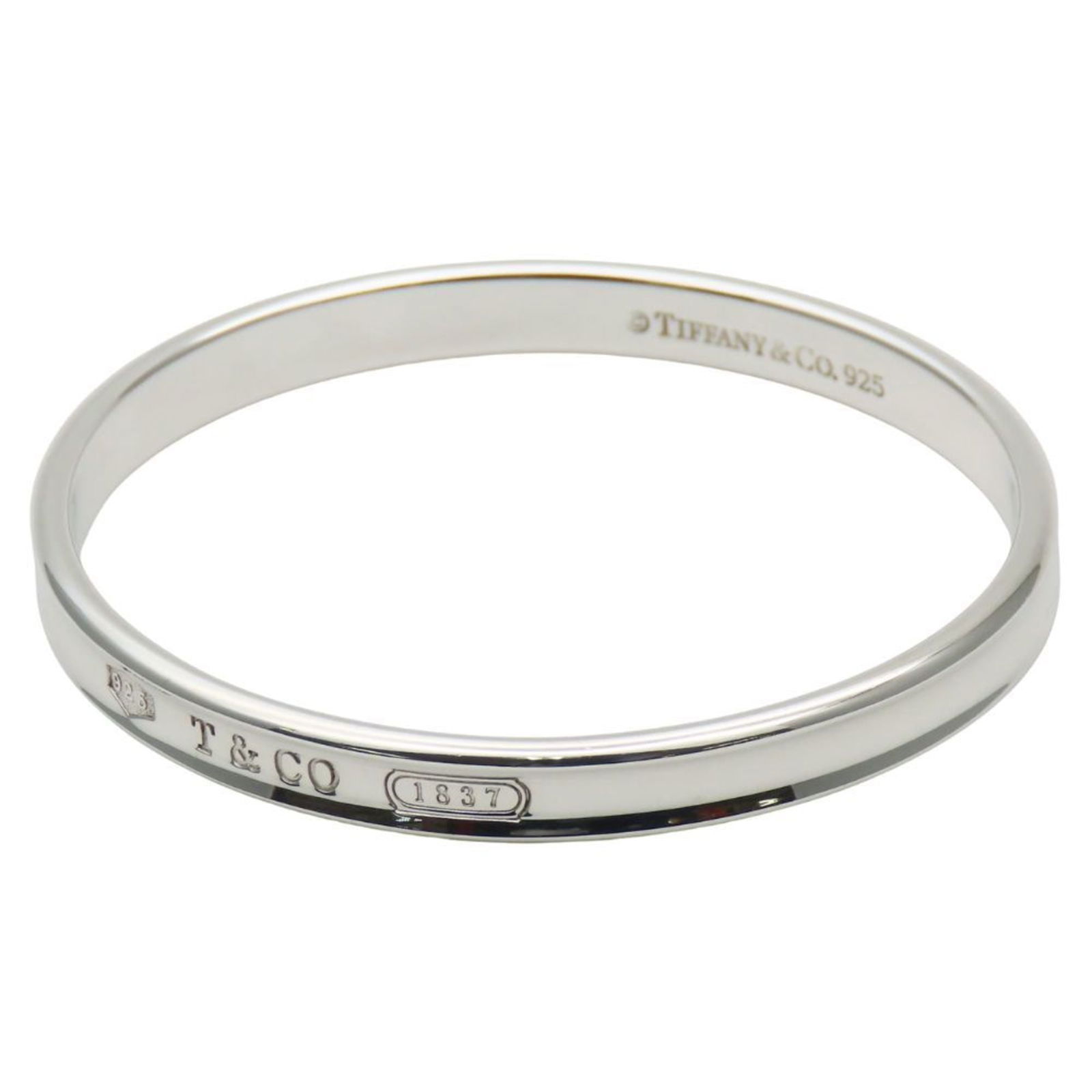 925 Tiffany Bangle Silver: 925 Tiffany Bangle Silver This listing features 925 Tiffany Bangle Silver. Item specifics are provided below. Item Specifics: Brand: Tiffany Type: Bangle Gender: Women Material: Silver 925 Color: Silv