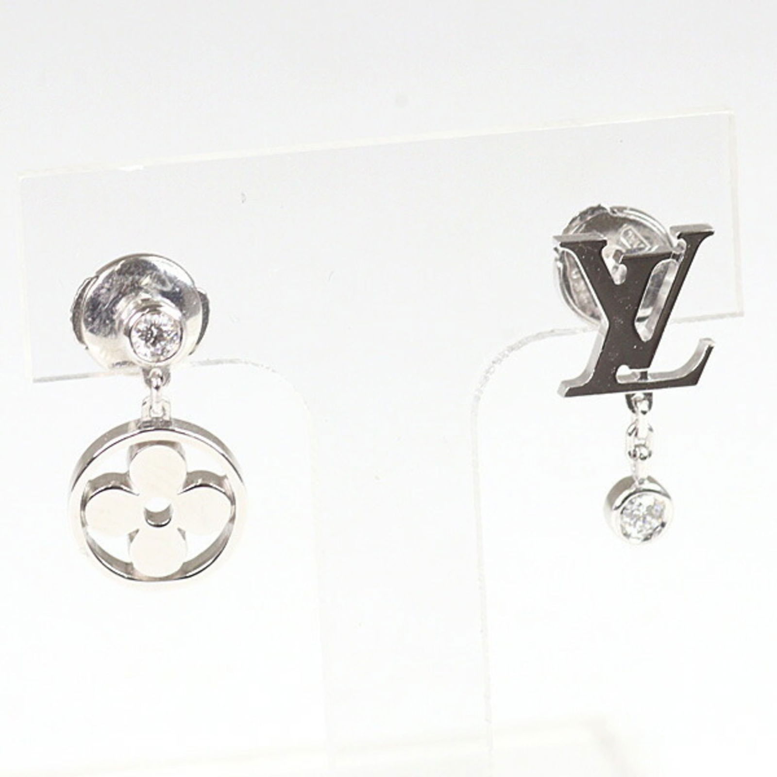 (18K) Louis Vuitton Drop Earrings White Gold: (18K) Louis Vuitton Drop Earrings White Gold This listing features (18K) Louis Vuitton Drop Earrings White Gold. Item specifics are provided below. Item Specifics: Brand: Louis Vuitton Type: Drop