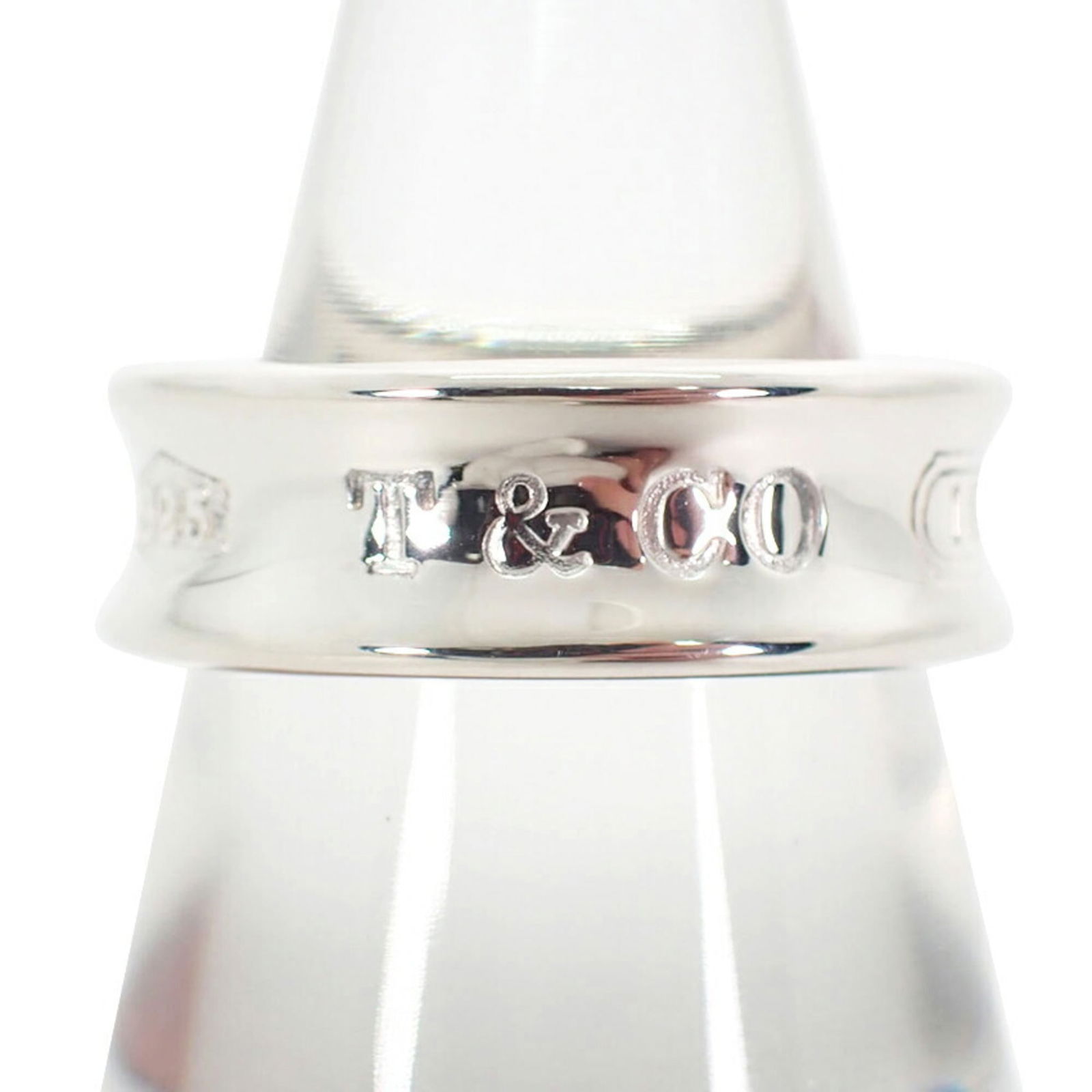925 Tiffany Band Ring Sterling Silver: 925 Tiffany Band Ring Sterling Silver This listing features 925 Tiffany Band Ring Sterling Silver. Item specifics are provided below. Item Specifics: Brand: Tiffany Type: Band Ring Gender: Women