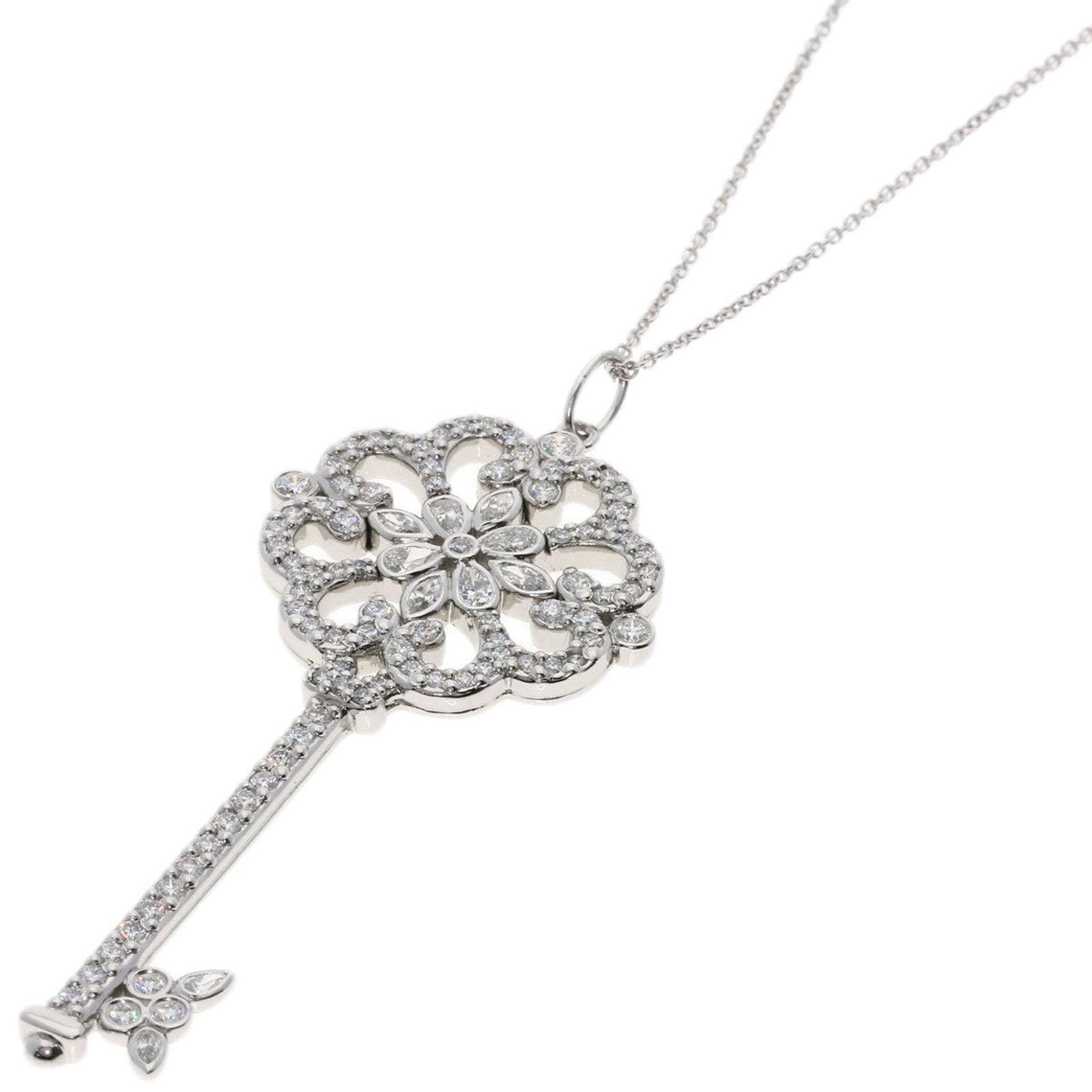 Co. Tiffany Enchant Prim Rose Key Diamond Necklace in 18K White Gold for Women. TIFFANY &: Co. Tiffany Enchant Prim Rose Key Diamond Necklace in 18K White Gold for Women. TIFFANY & This listing features Co. Tiffany Enchant Prim Rose Key Diamond Necklace in 18K White Gold for Women. TIFFANY