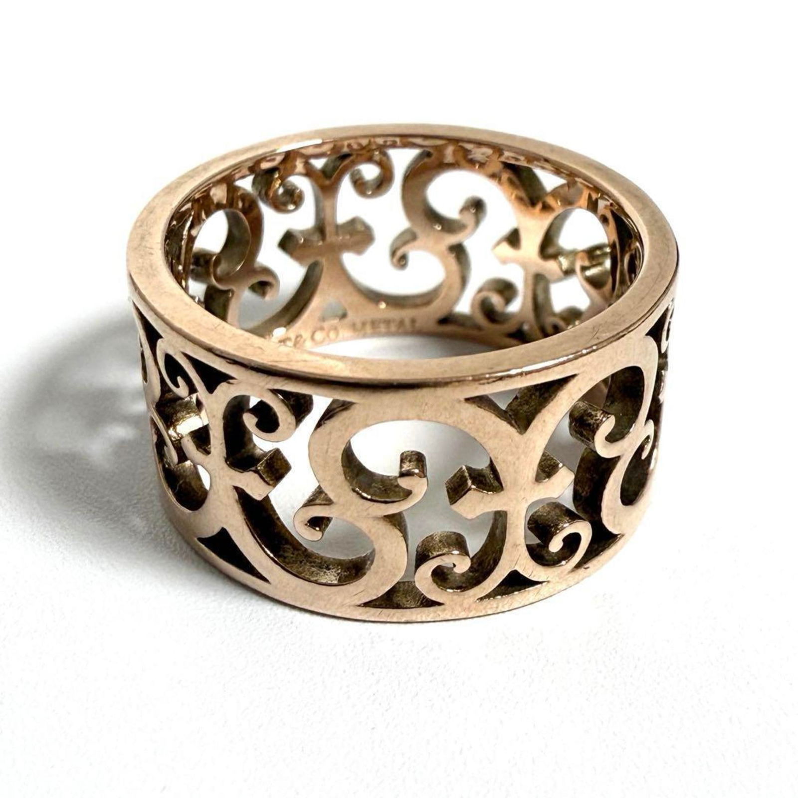 Metal Tiffany Band Ring: Metal Tiffany Band Ring This listing features Metal Tiffany Band Ring. Item specifics are provided below. Item Specifics: Brand: Tiffany Type: Band Ring Gender: Women Material: Metal Us Size: 5.5