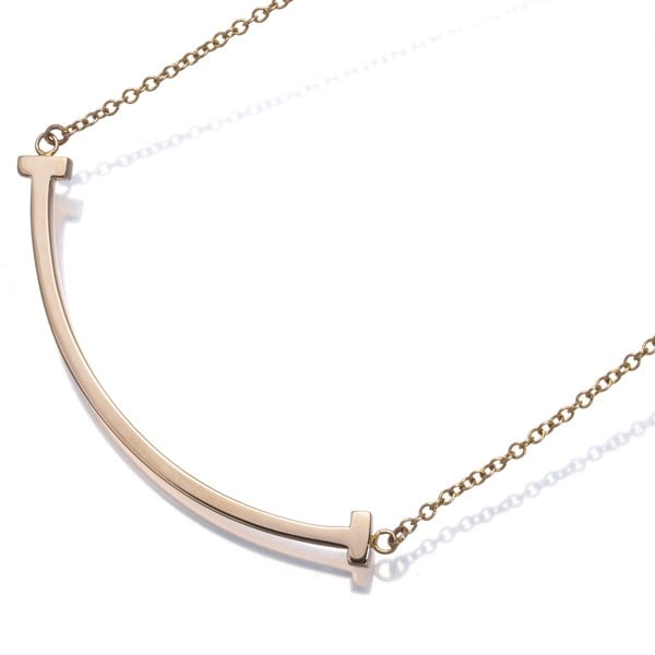 Gold Tiffany&Co. Necklace Tiffany T Smile Small 18K 750 Rose: Gold Tiffany&Co. Necklace Tiffany T Smile Small 18K 750 Rose This listing features Gold Tiffany&Co. Necklace Tiffany T Smile Small 18K 750 Rose. Item specifics are provided below. Item Specifics: