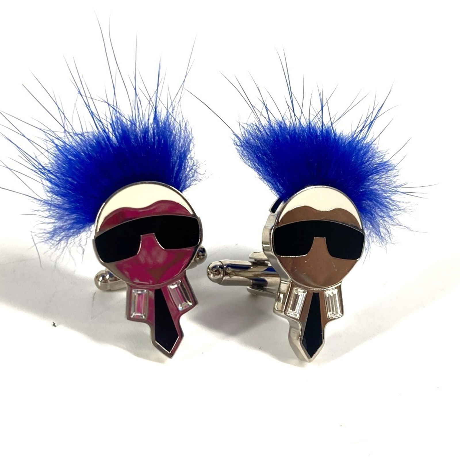 Metal Fendi Cufflinks: Metal Fendi Cufflinks This listing features Metal Fendi Cufflinks. Item specifics are provided below. Item Specifics: Brand: Fendi Type: Cufflinks Gender: Men Material: Metal Color: Blue, Silver Color
