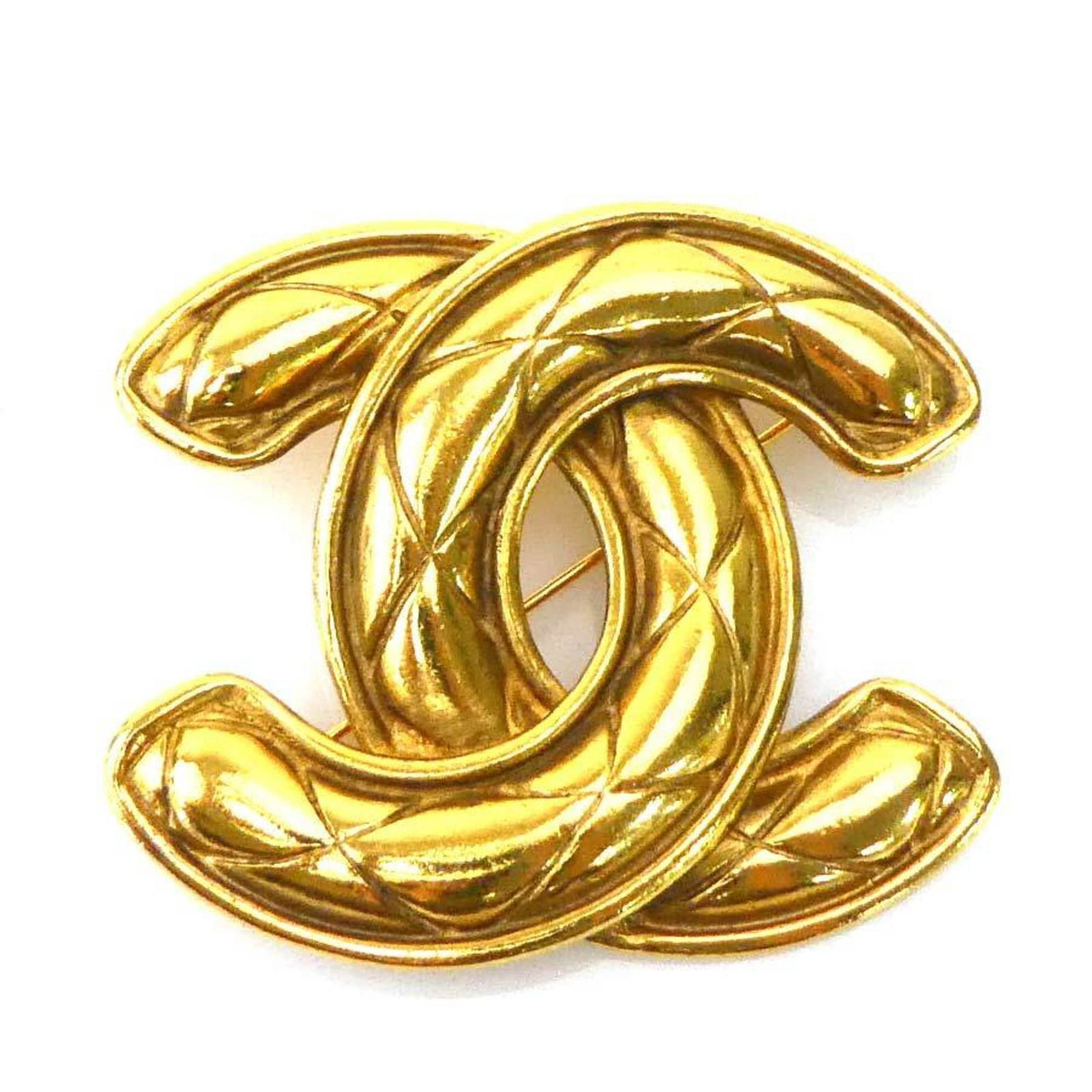 Metal Chanel Brooch: Metal Chanel Brooch This listing features Metal Chanel Brooch. Item specifics are provided below. Item Specifics: Brand: Chanel Type: Brooch Gender: Women Material: Metal Color: Gold Size (Hxwxd):
