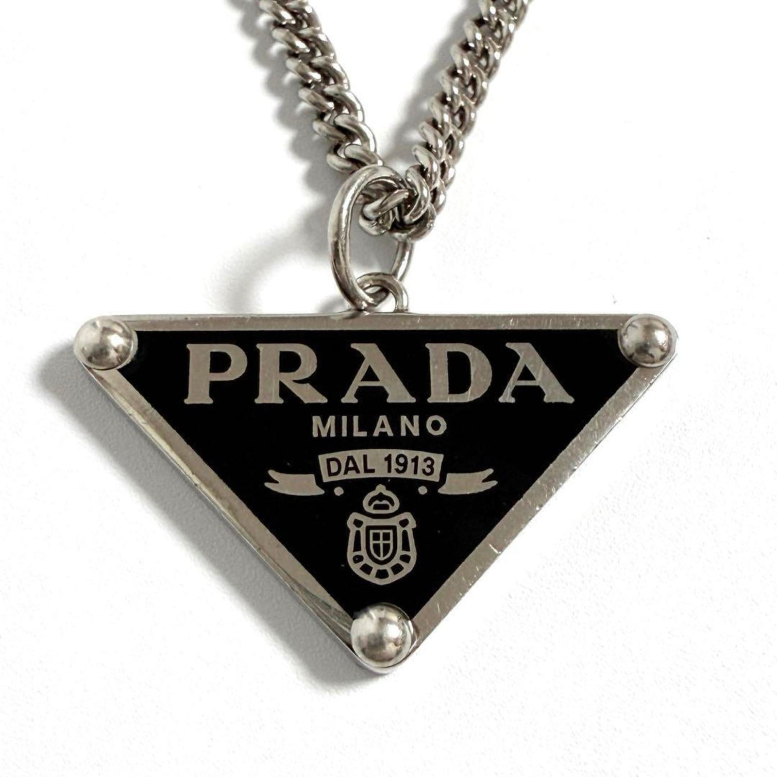 Pendant Prada Men's and Women's Symbol Necklace: Pendant Prada Men's and Women's Symbol Necklace This listing features Pendant Prada Men's and Women's Symbol Necklace. Item specifics are provided below. Item Specifics: Brand: Prada Necklace Type: Ne